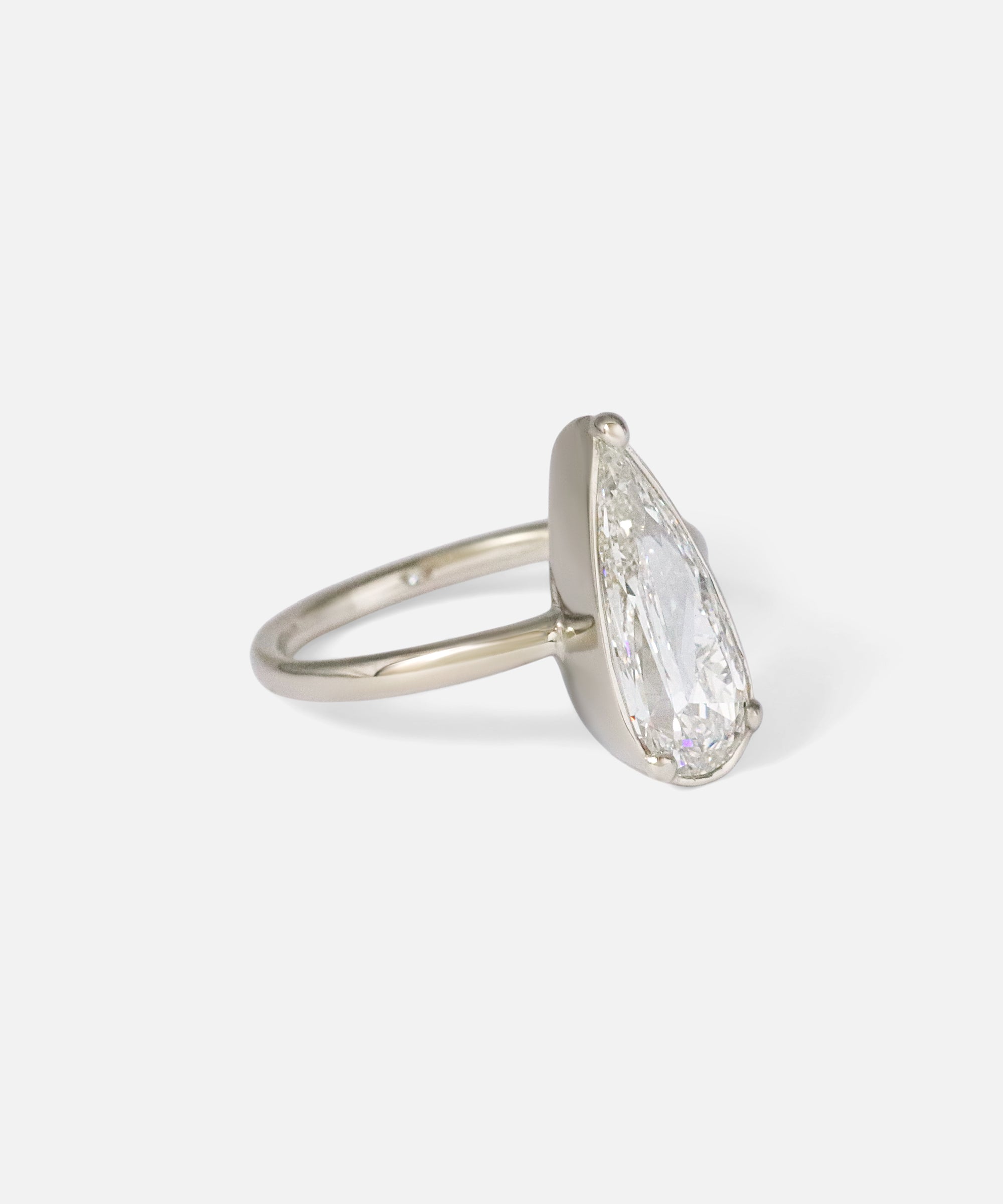 Angled side view of Dew 54 / Modified Pear Cut Diamond Ring by Hiroyo