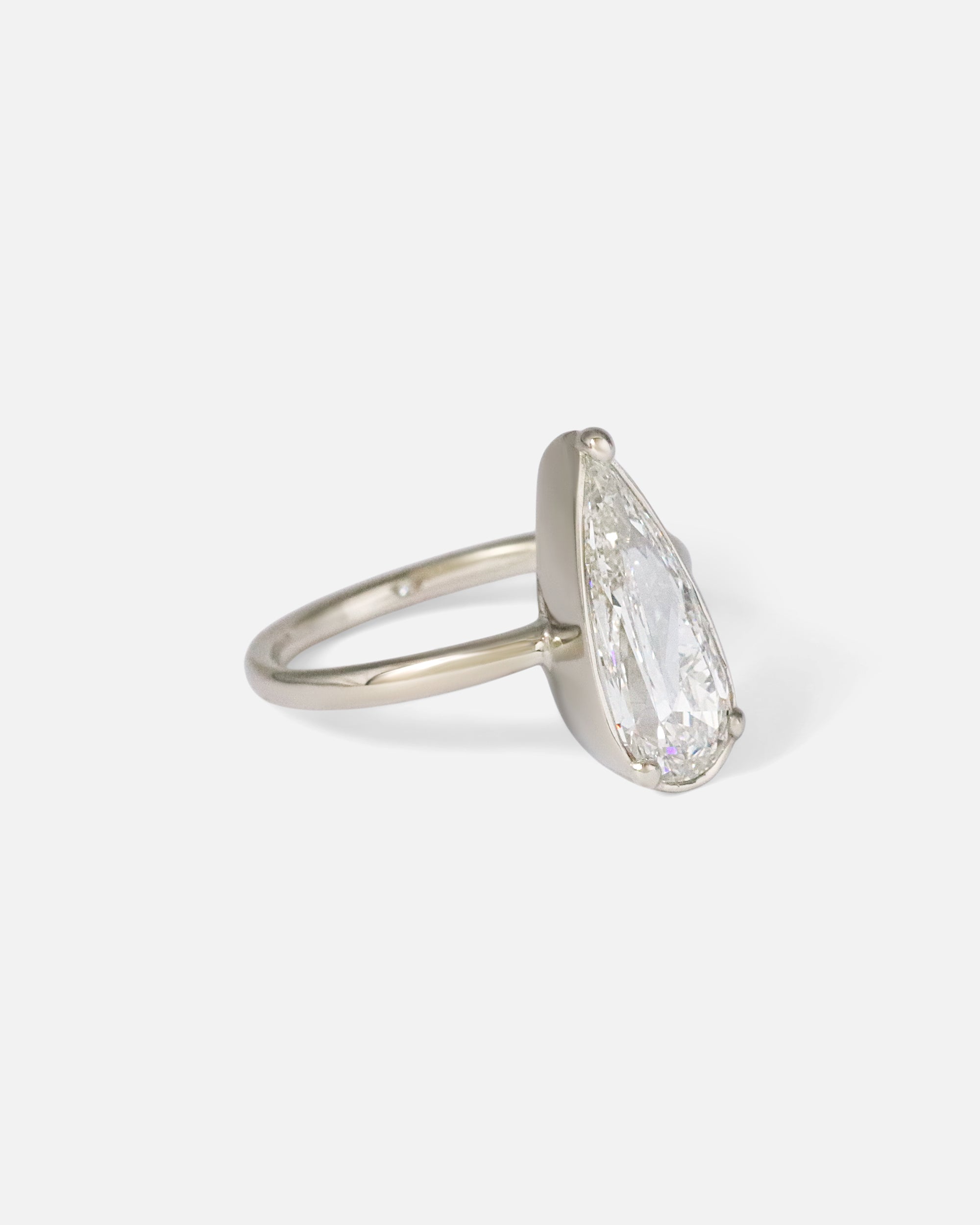 Angled side view of Dew 54 / Modified Pear Cut Diamond Ring by Hiroyo