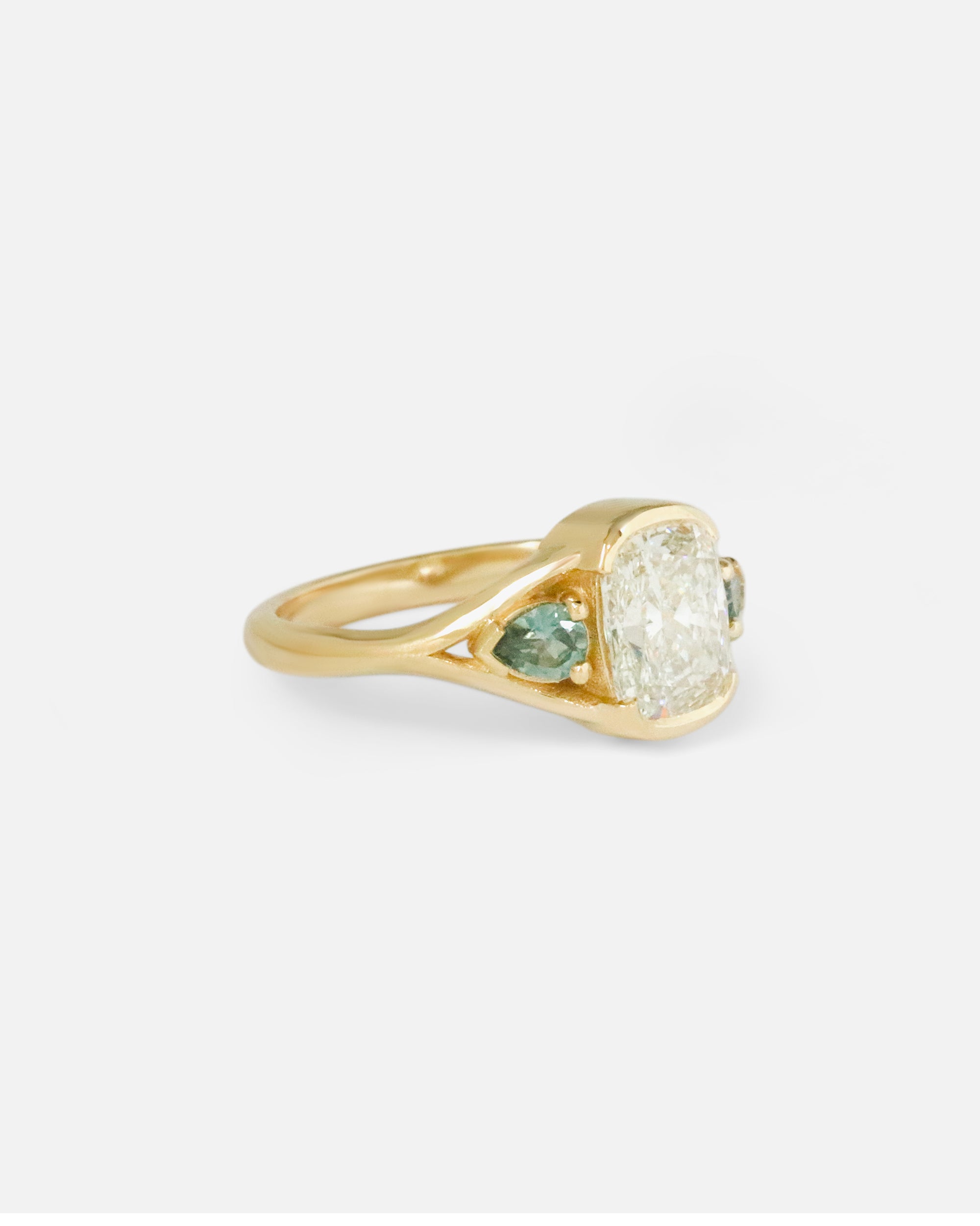 Angled side view of Triple Tributary Ring by Kestrel Dillon