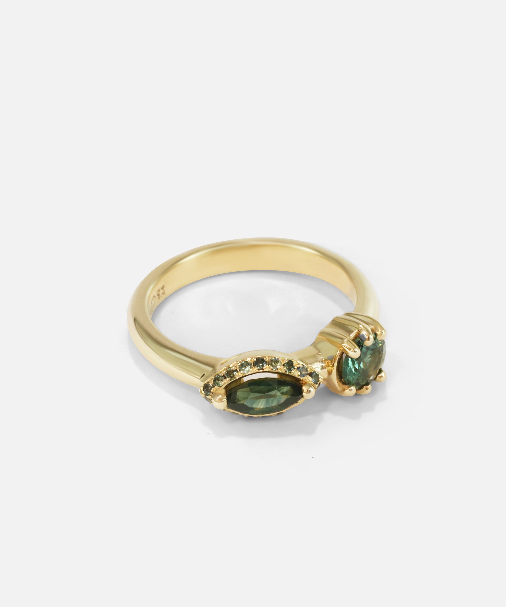 Side view of Helix Nebula Teal Sapphire Ring