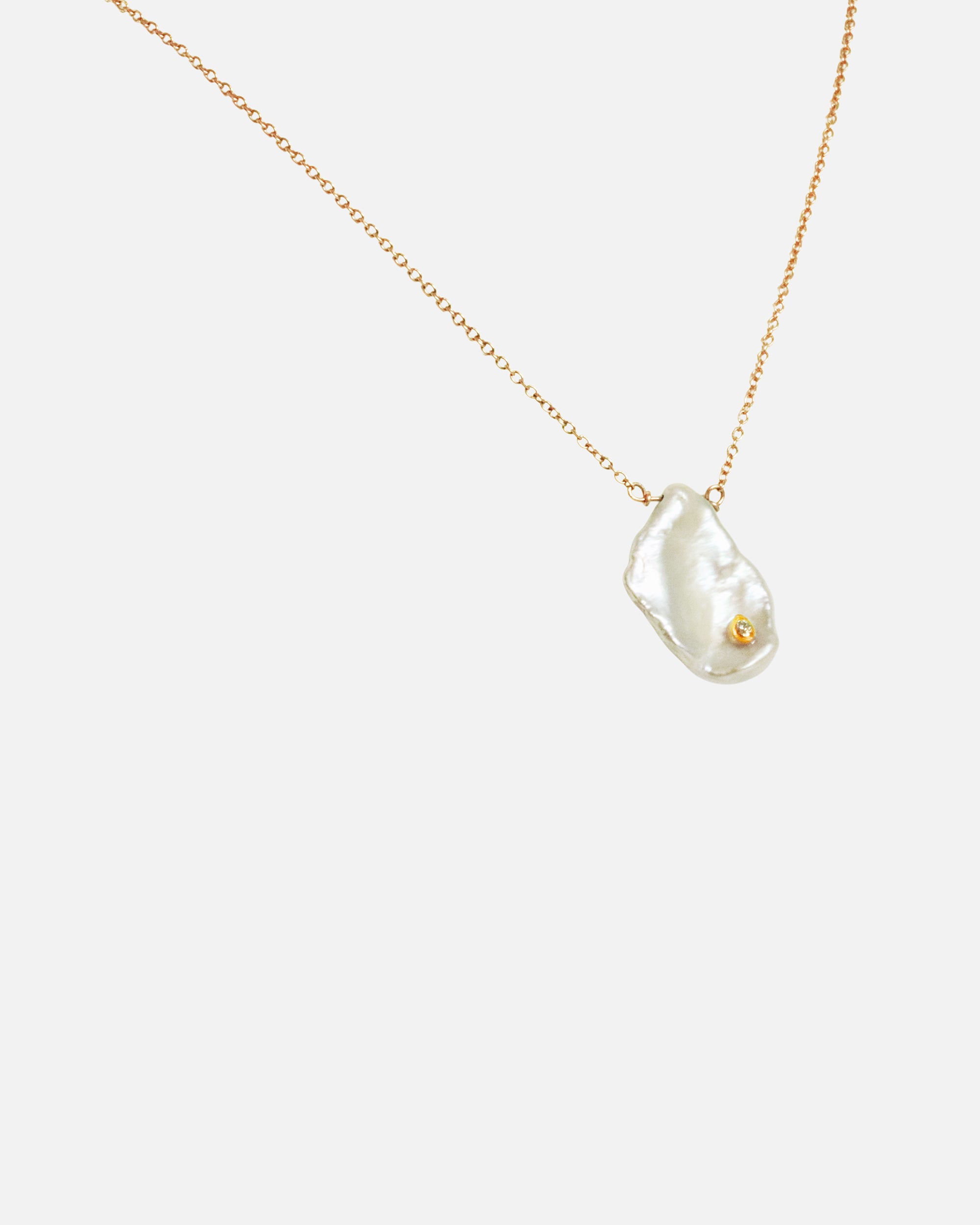 Angled side view of Keshi Petal / Pearl and Diamond Necklace VI by Ariko