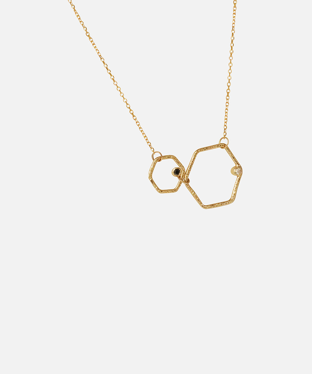 Side view of Hexagon Necklace / Black and White Diamonds by Ariko