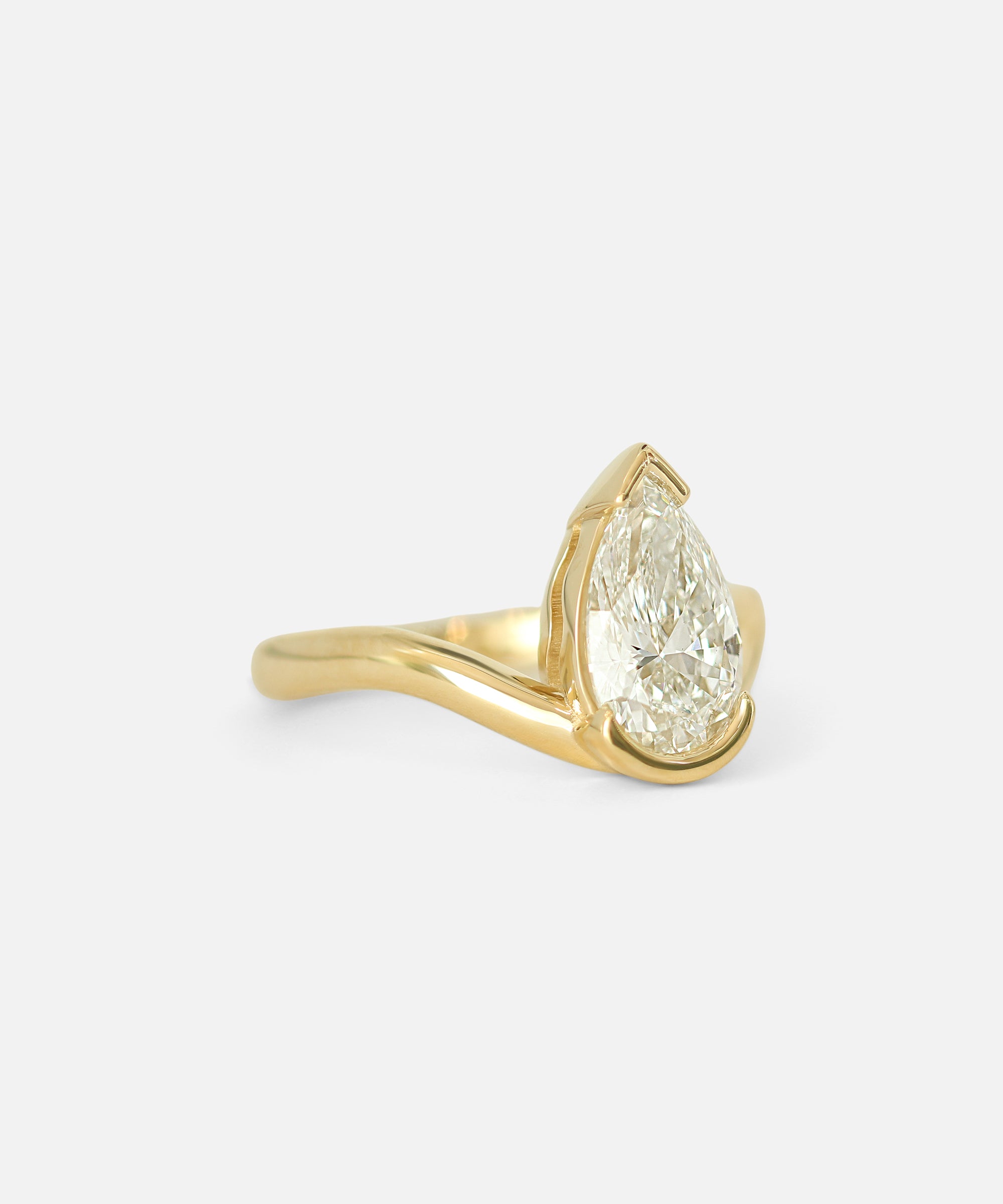 Angled side view of Solas Ring / Pear Diamond by Ciara Alice