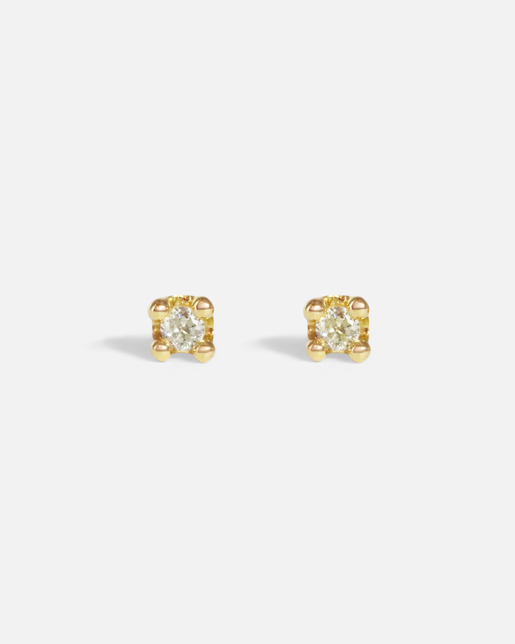 Front view of Dew 46 / Old Mine Cut Diamond Earrings by Hiroyo