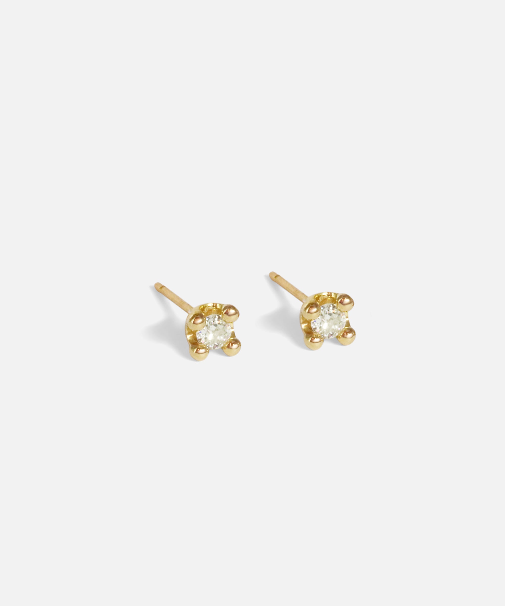 Angled side view of Dew 46 / Old Mine Cut Diamond Earrings by Hiroyo