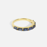 Side view of Baguette Sapphire Ring in 18k yellow gold