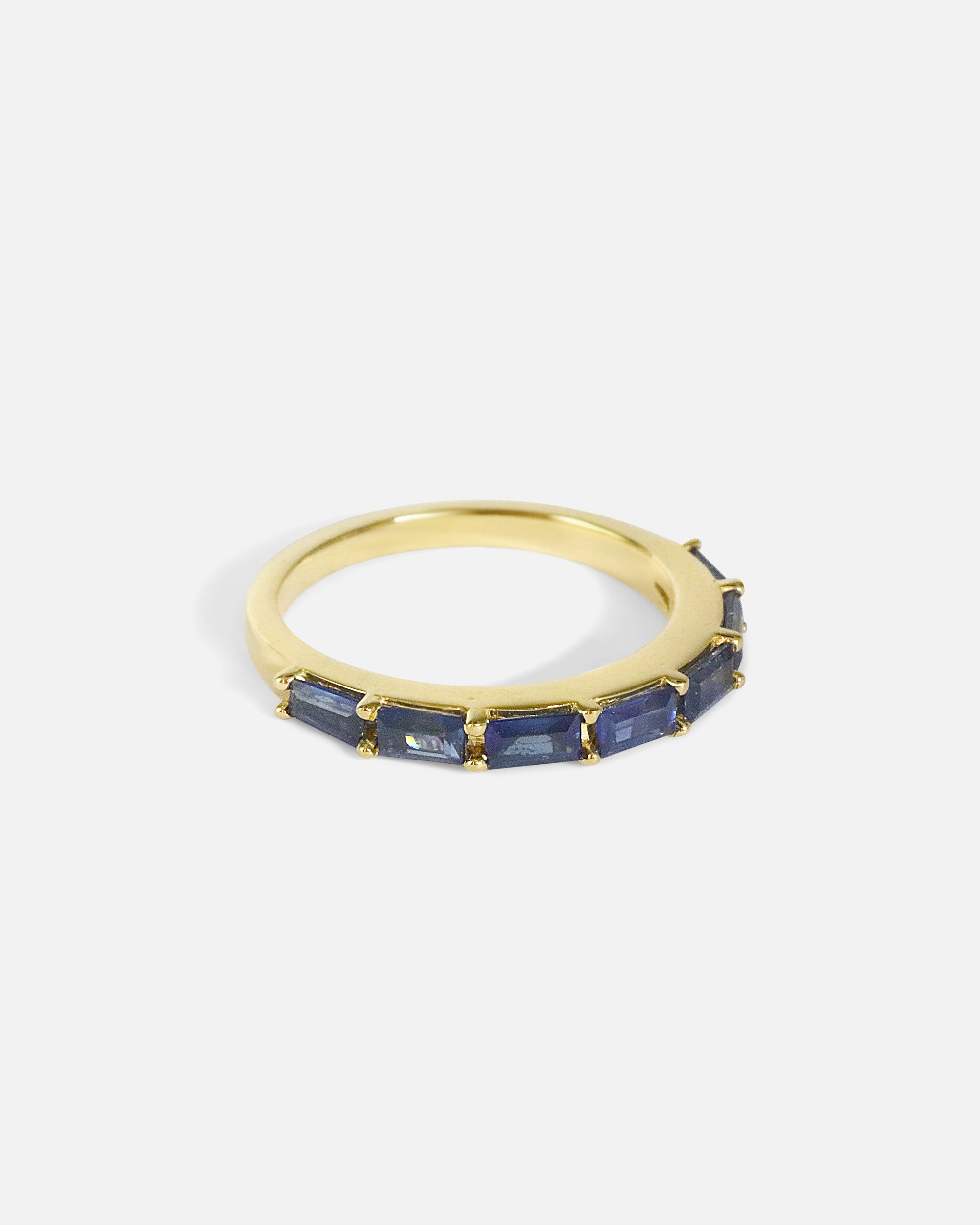 Side view of Baguette Sapphire Ring in 18k yellow gold