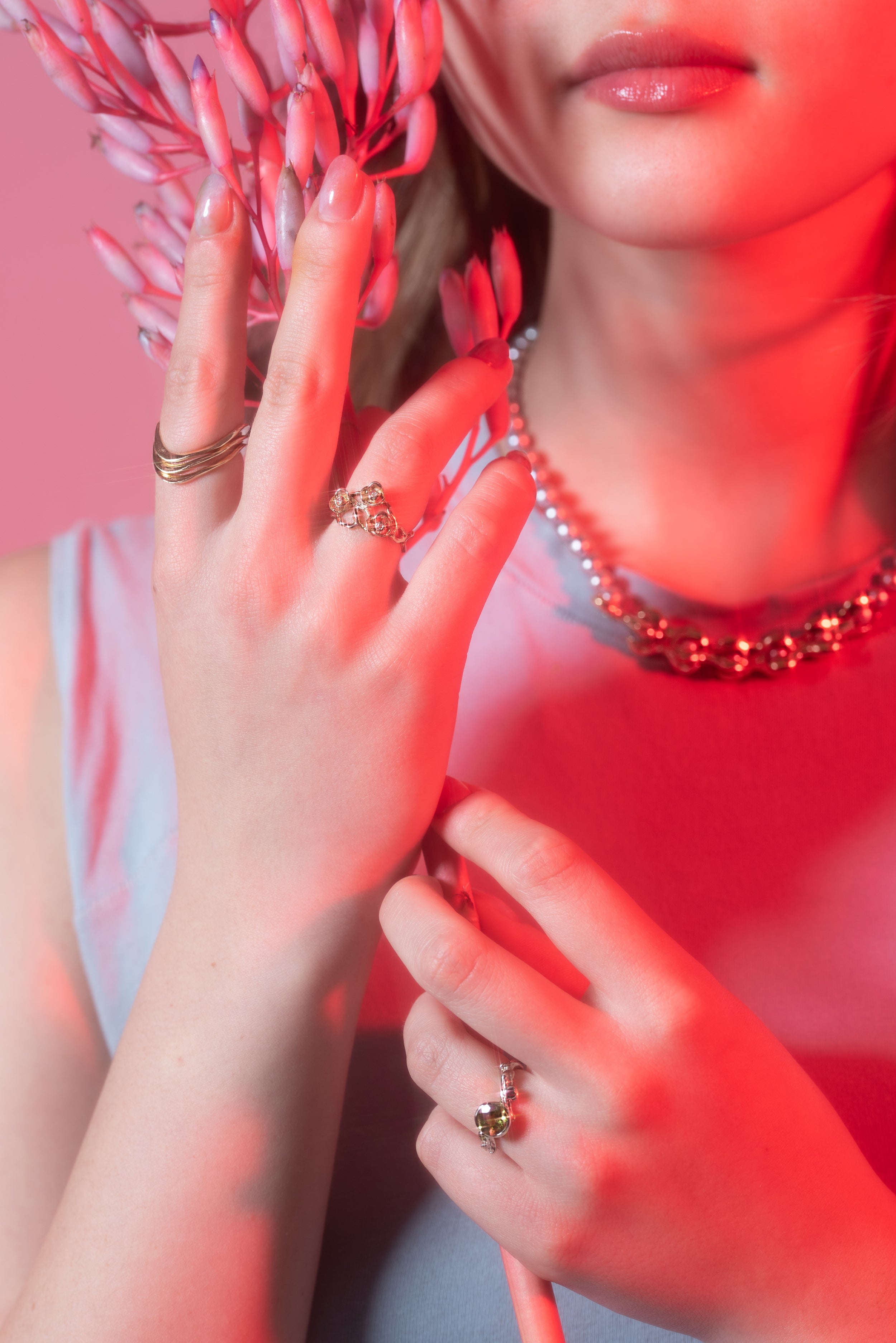 Model wearing Lucia B Marti's Pearl Necklace / 3mm alongside various rings from featured collection