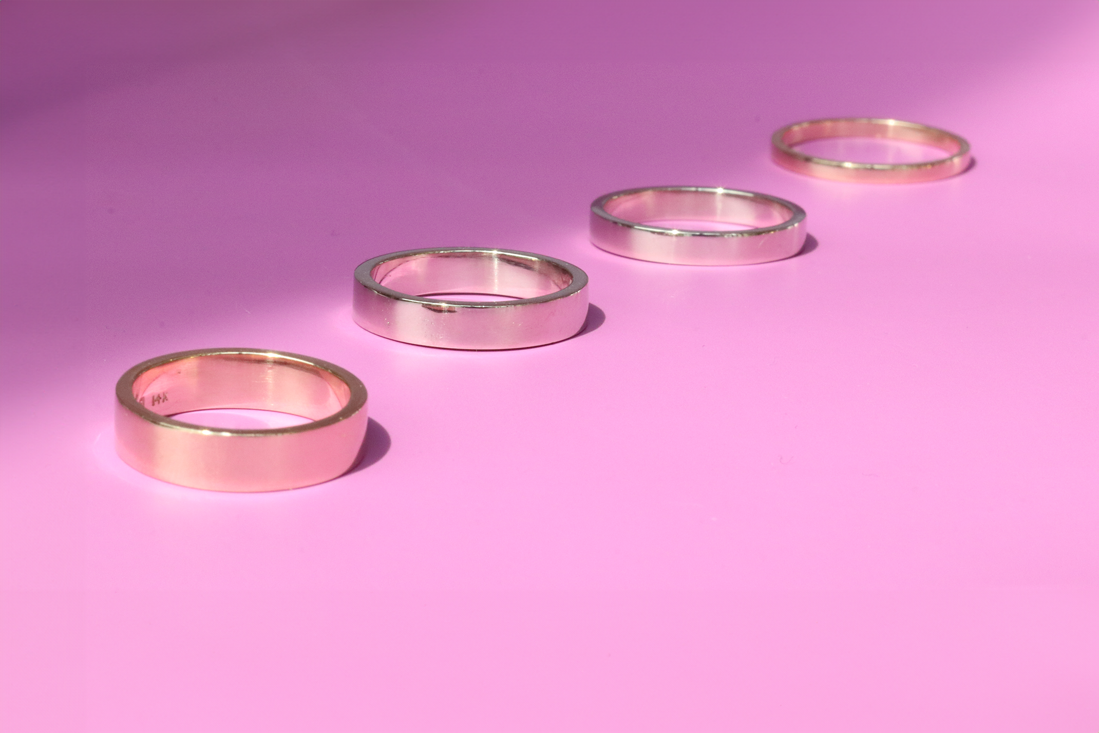 Group shot Flat Band / 5.5mm, Flat Band / 4.5mm, Flat Band / 3.5mm and Flat Band / 2mm from the Classic House Bands collection by Fitzgerald Jewelry