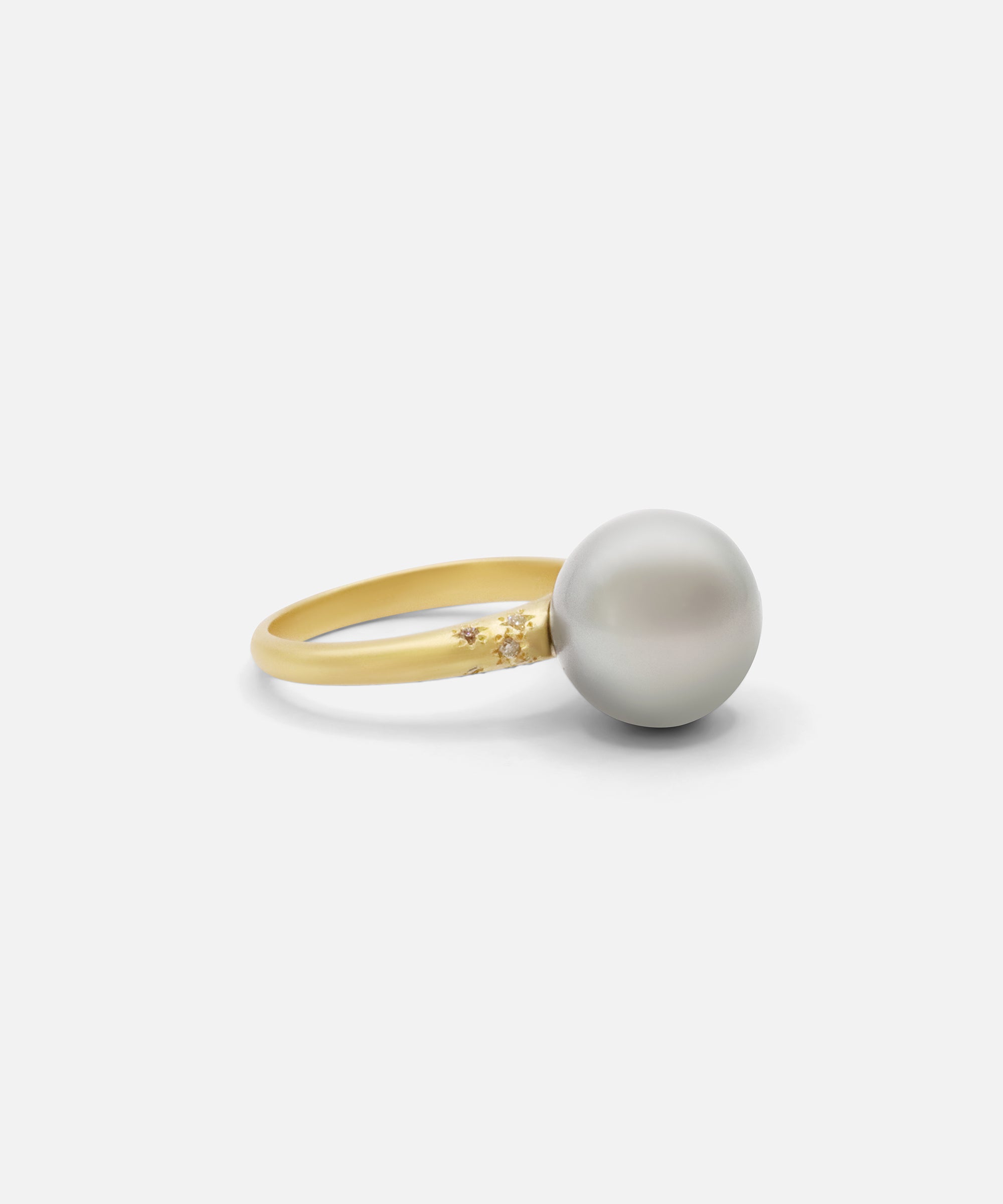Side view of Umi / South Sea Pearl and Melee Diamond Ring