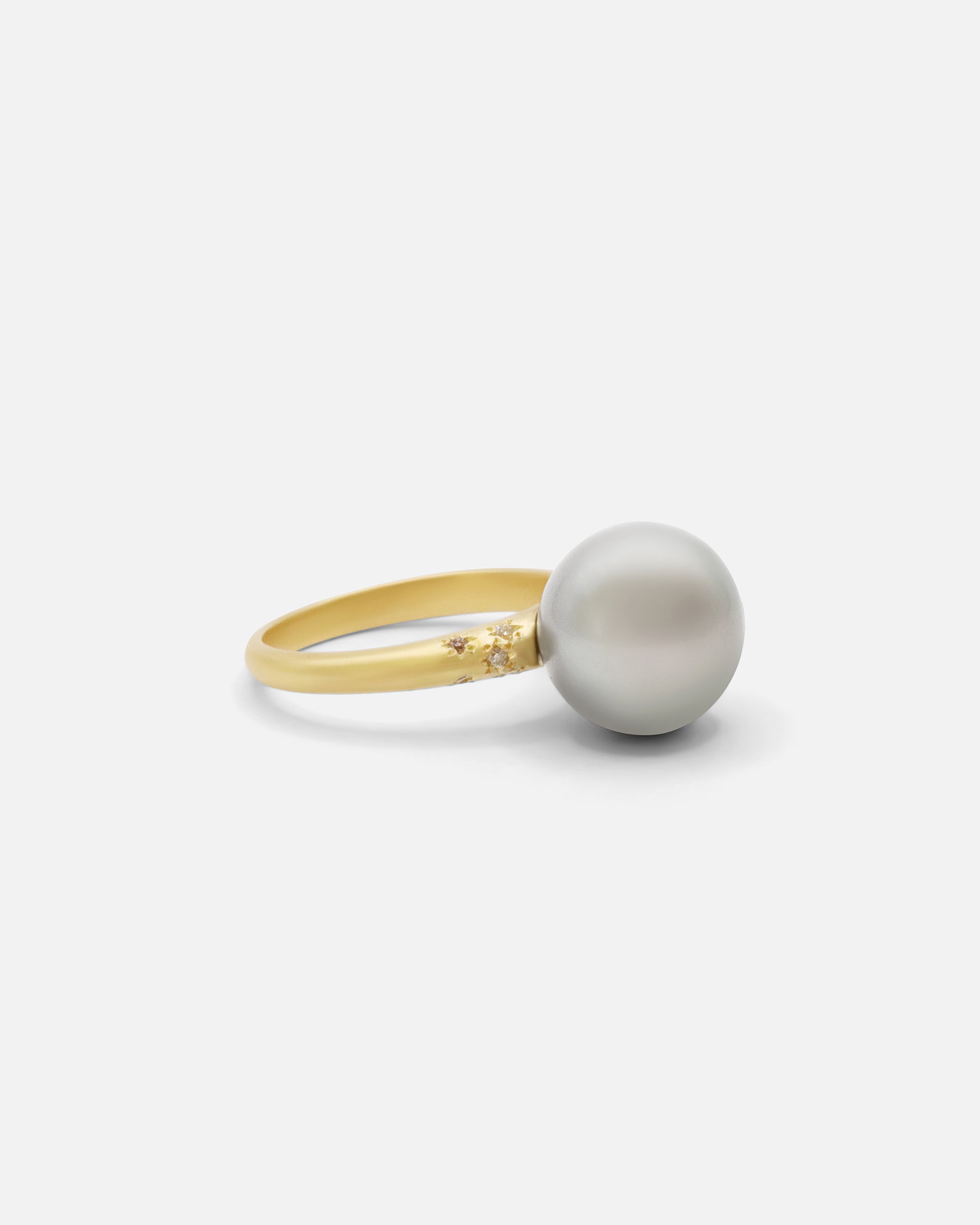 Side view of Umi / South Sea Pearl and Melee Diamond Ring
