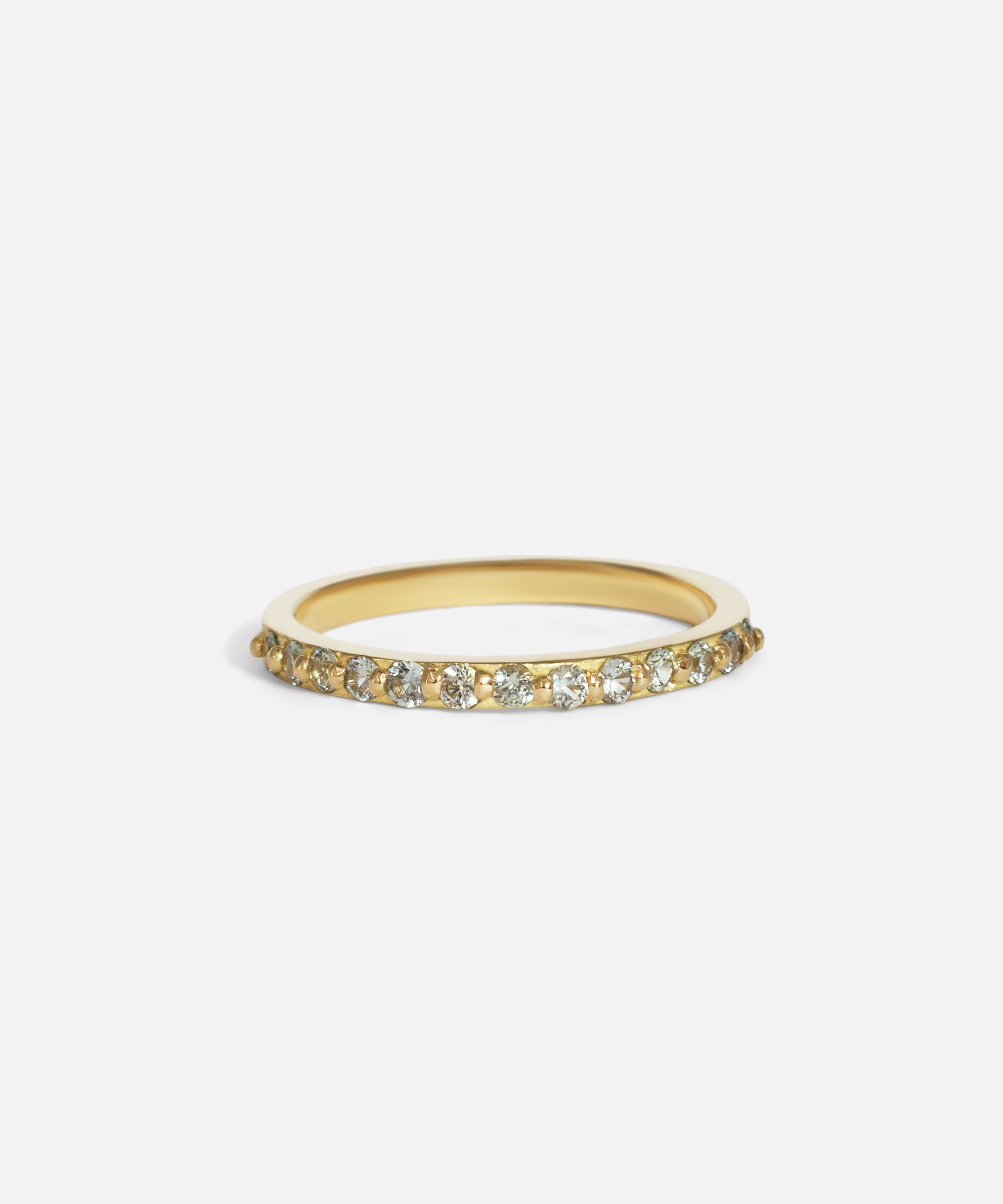 Front view of Dew 3mm / Blue Green Sapphire in 18k yellow gold by Hiroyo