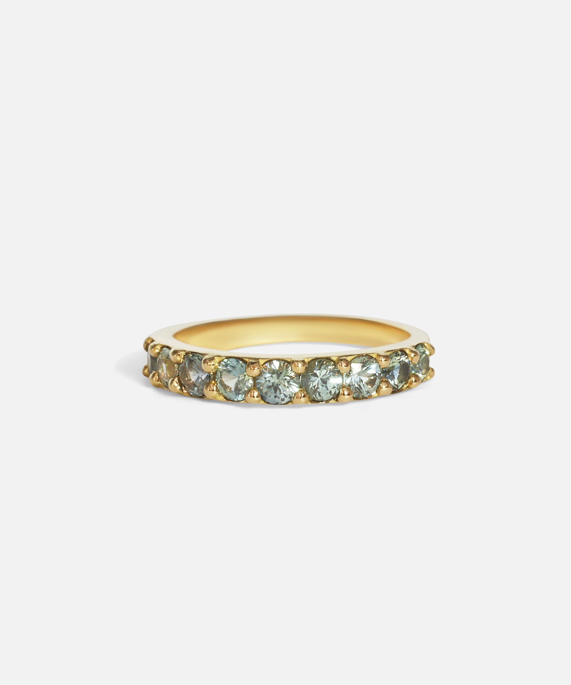 Front view of Dew 3mm / Blue Green Sapphire in 18k yellow gold by Hiroyo