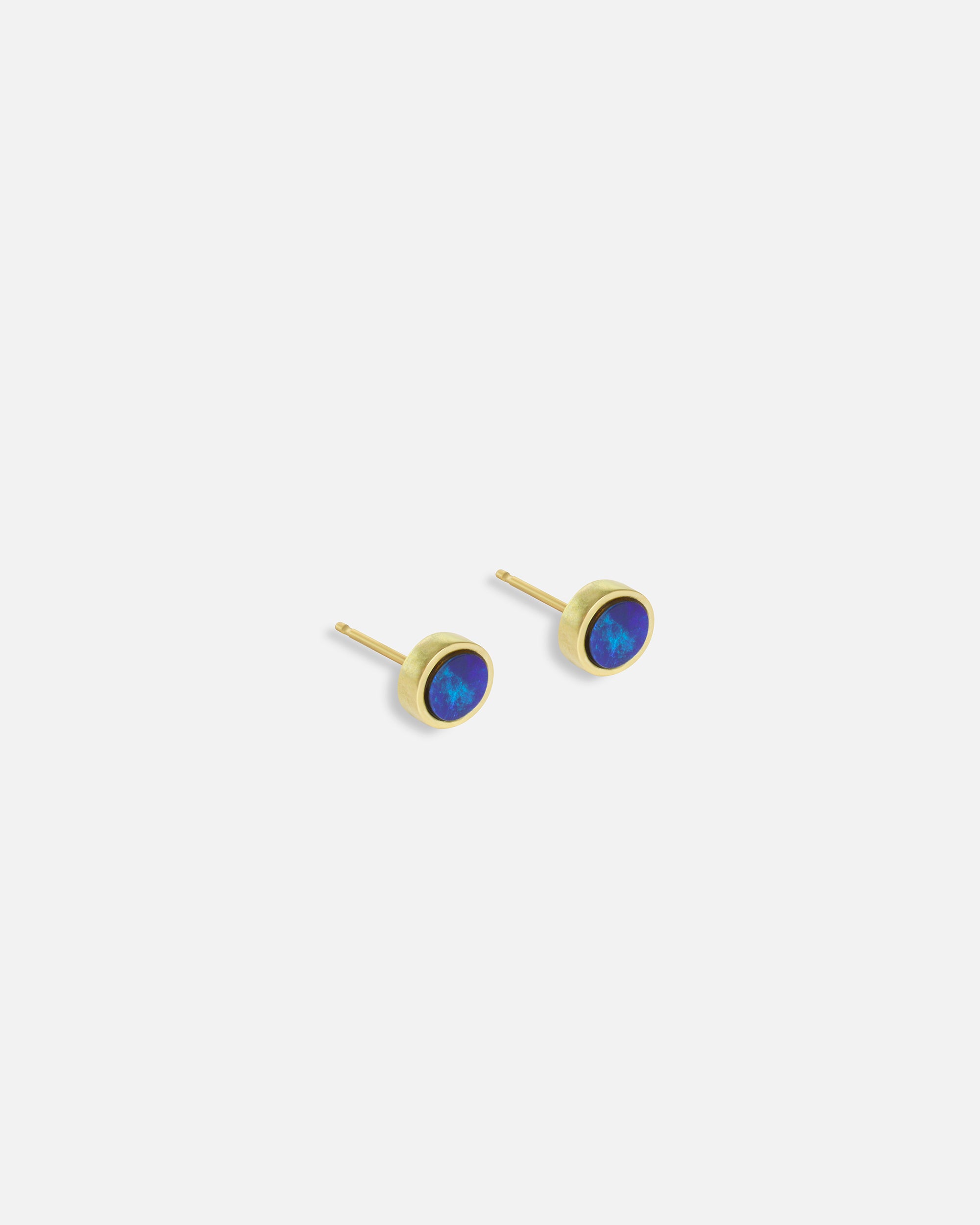 Side view of Nugget / Black Opal Doublet Earrings by Hiroyo