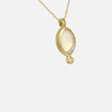 Close up side view of Nugget / Mexican Fire Opal with Melee Diamond Pendant by Hiroyo