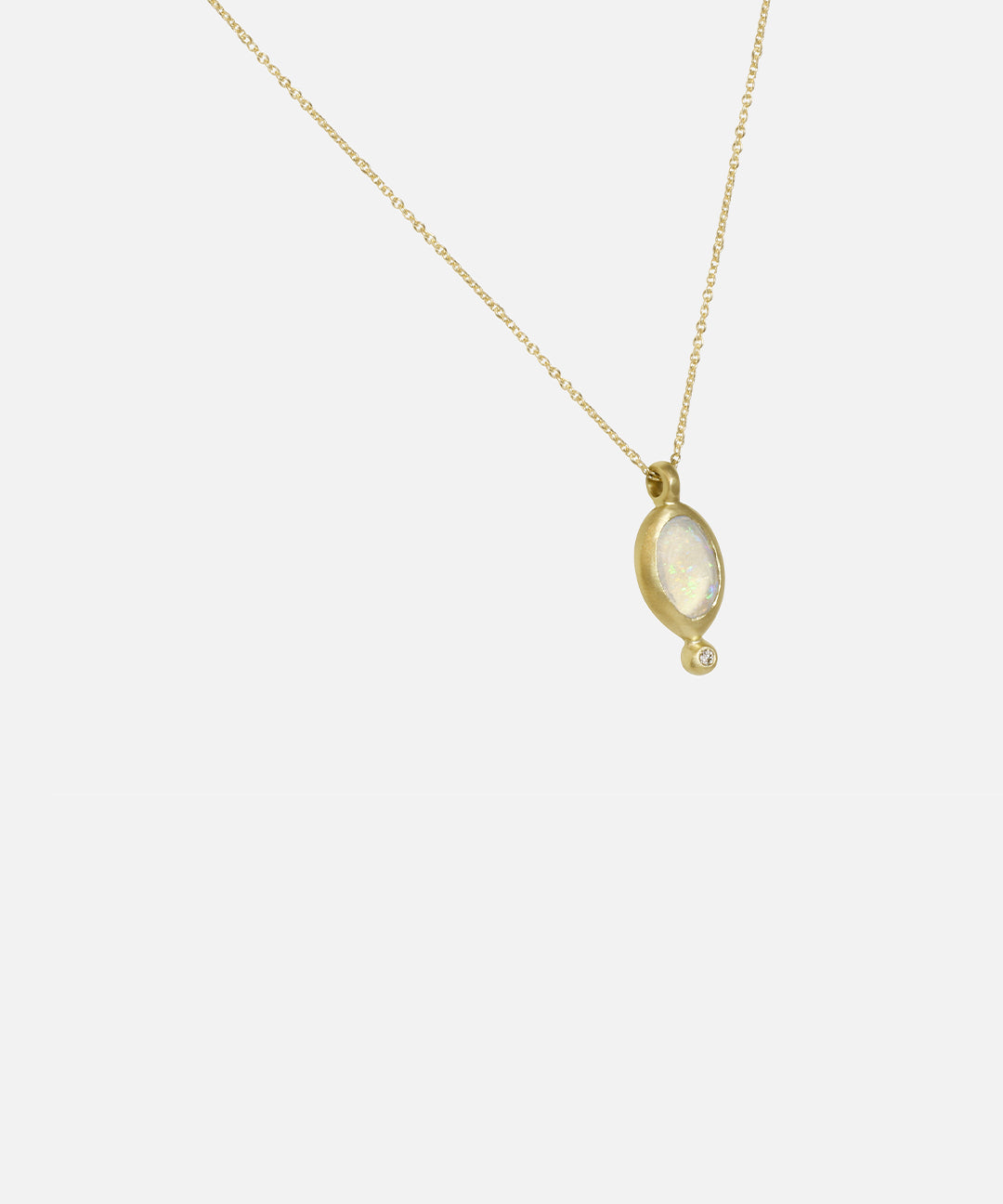 Side view of Nugget / Mexican Fire Opal with Melee Diamond Pendant by Hiroyo