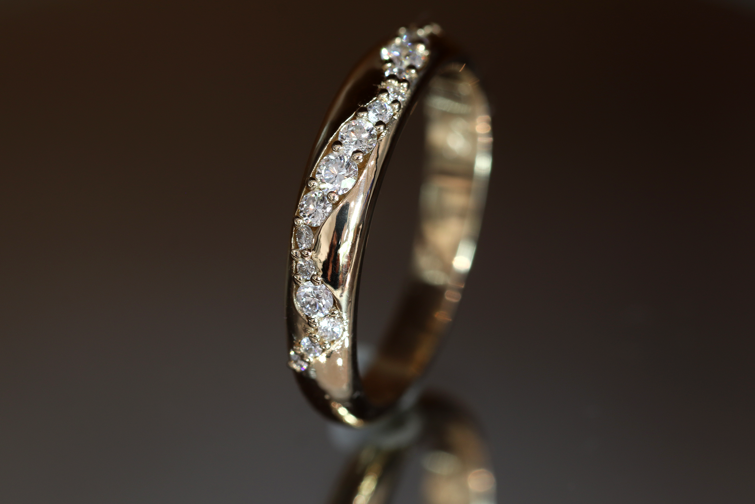 Custom white diamond wedding band created at Fitzgerald Jewelry