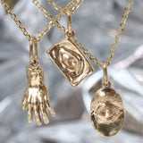 Group shout of showing back of the Theia Pendant, Intagliuax Oval Pendant, and Intagliuax Pendant