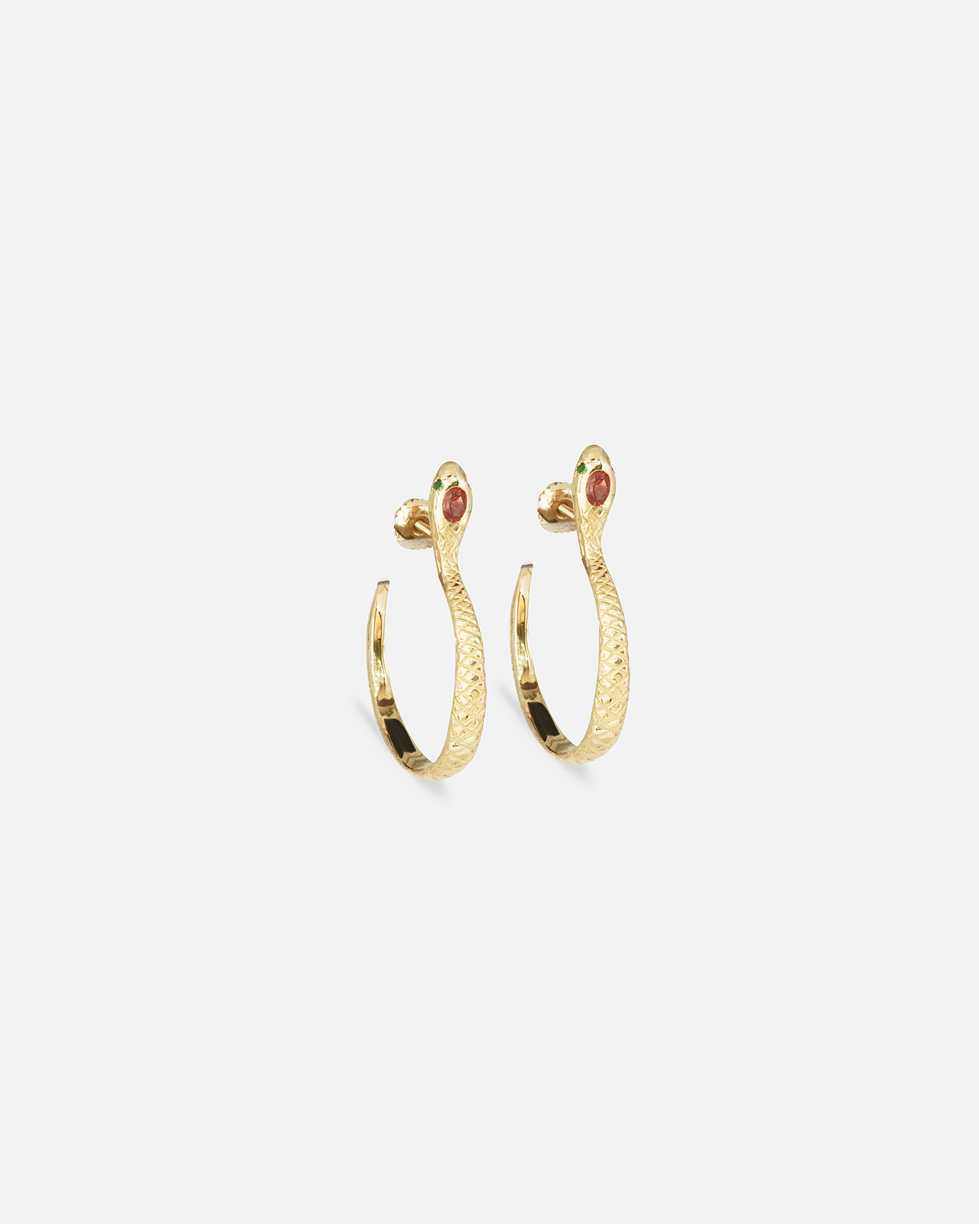 Angled side view of Ophidia Circuli Earrings by Ides