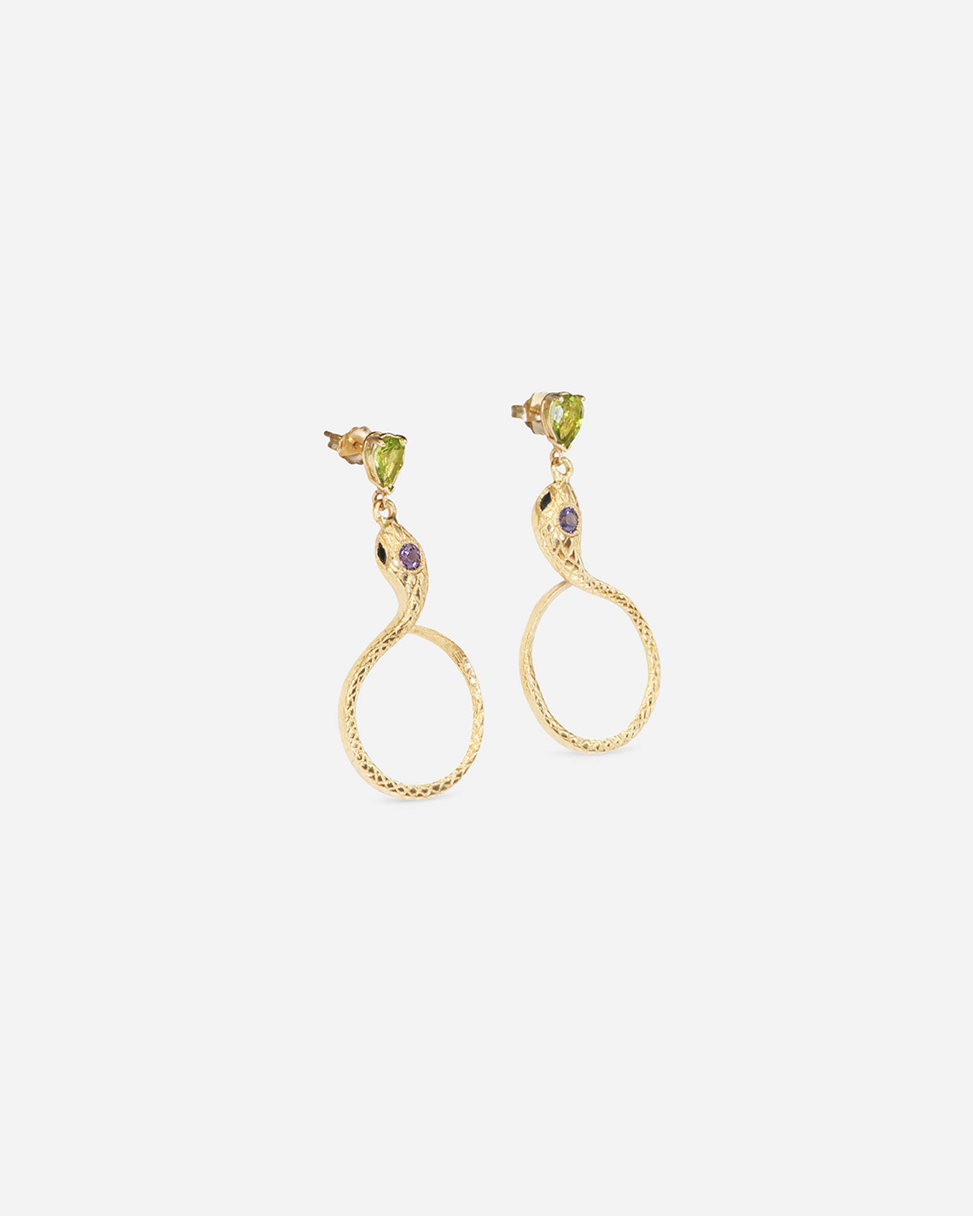 Angled side view of Ophidia Drop Circuli Earrings by Ides