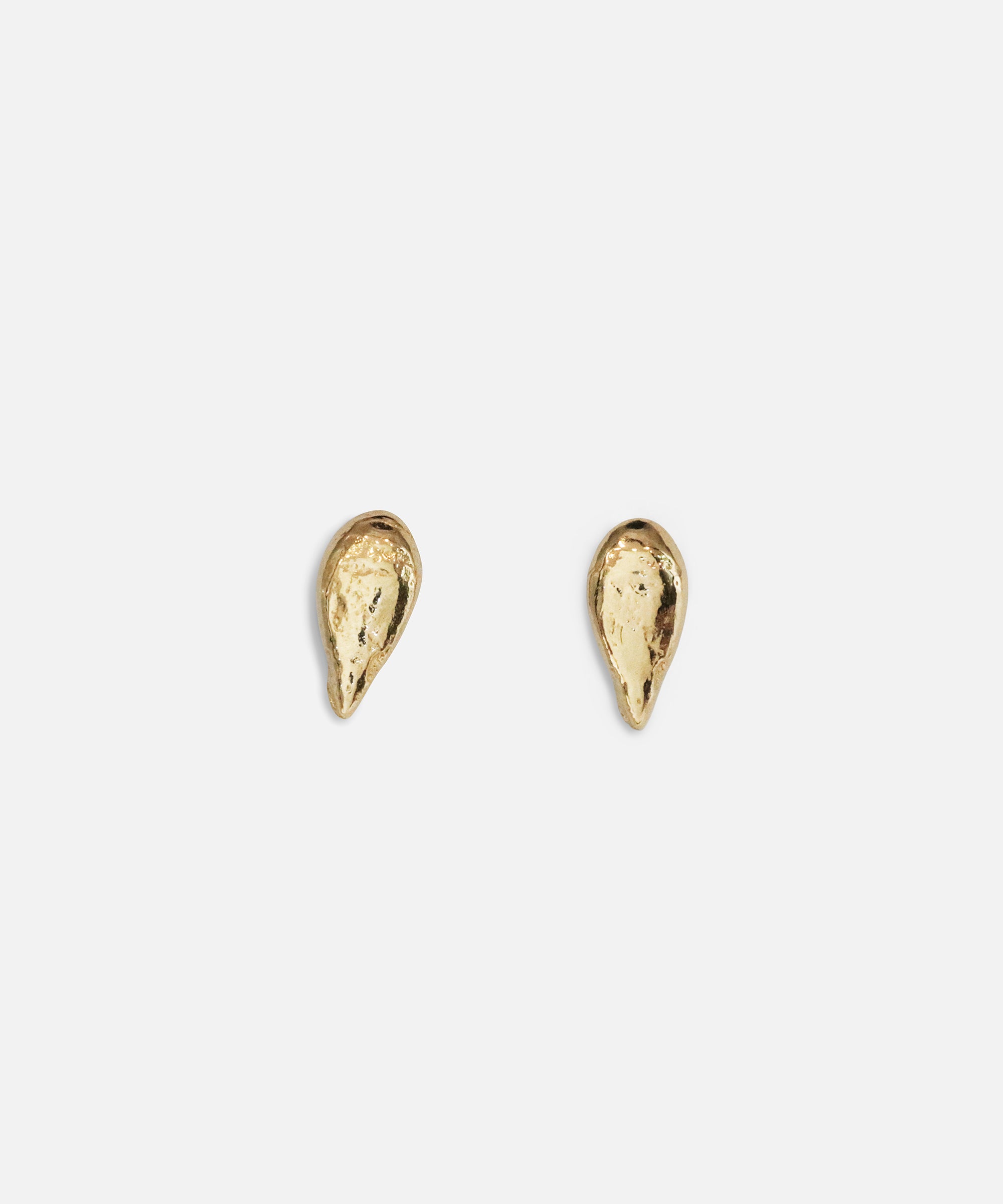 Front view of a two pieces of Pyrus Strega Studs by Ides