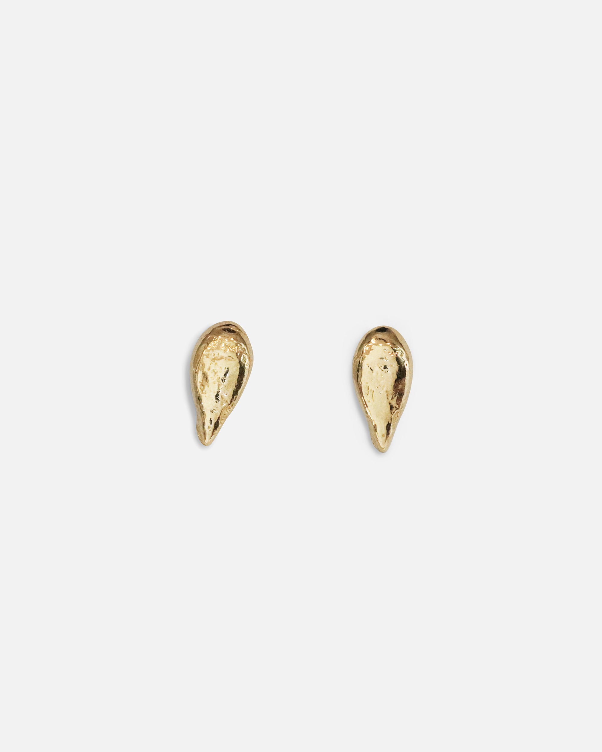 Front view of a two pieces of Pyrus Strega Studs by Ides
