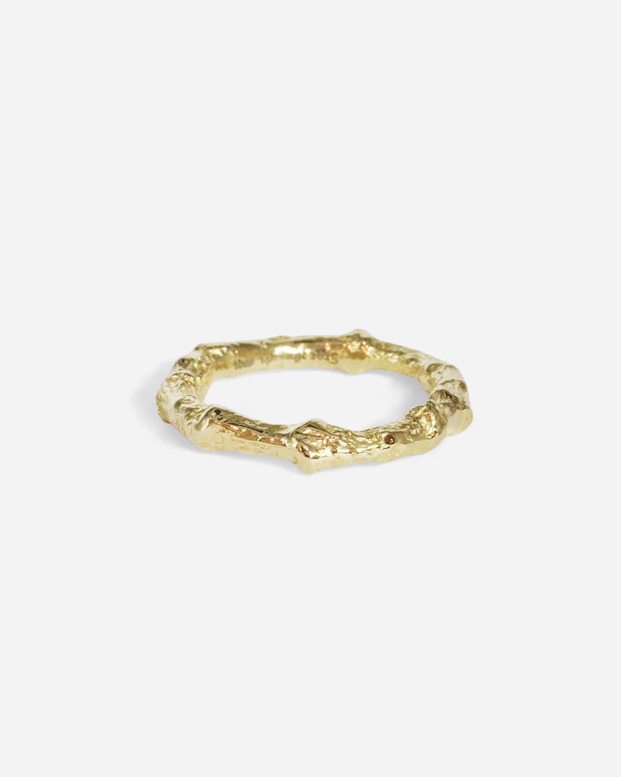 Side view of Bone Tree Band / Small in 14k yellow gold by Ides