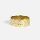 Side view of Poesie-on-the-Outside Wedding Band by Ides
