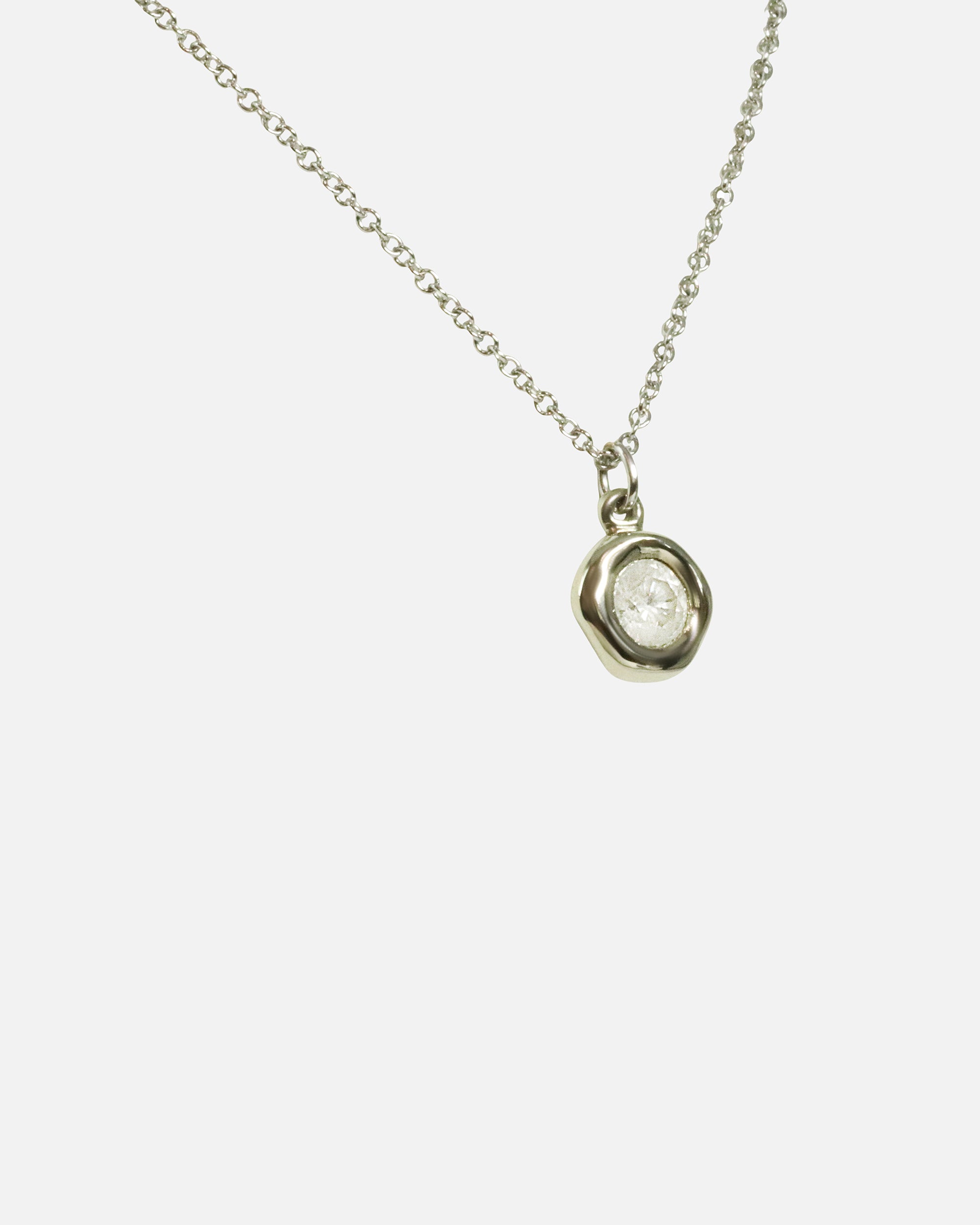 Angled side view of Star Jelly Pendant / Milky Diamond by Kestrel Dillon