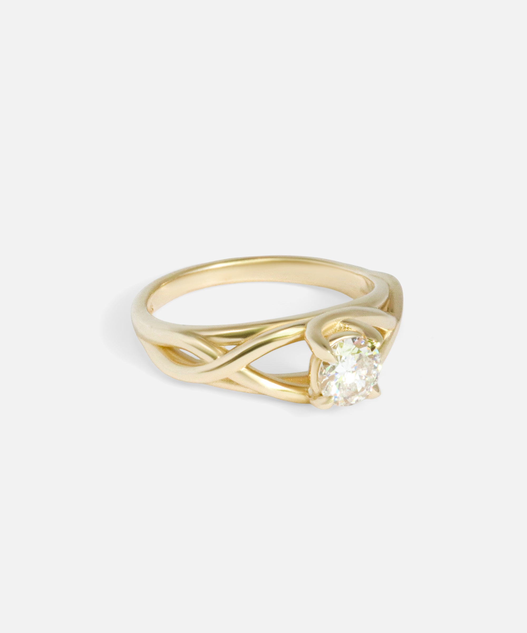 Angled side view of Twist Solitaire Ring by Kestrel Dillon