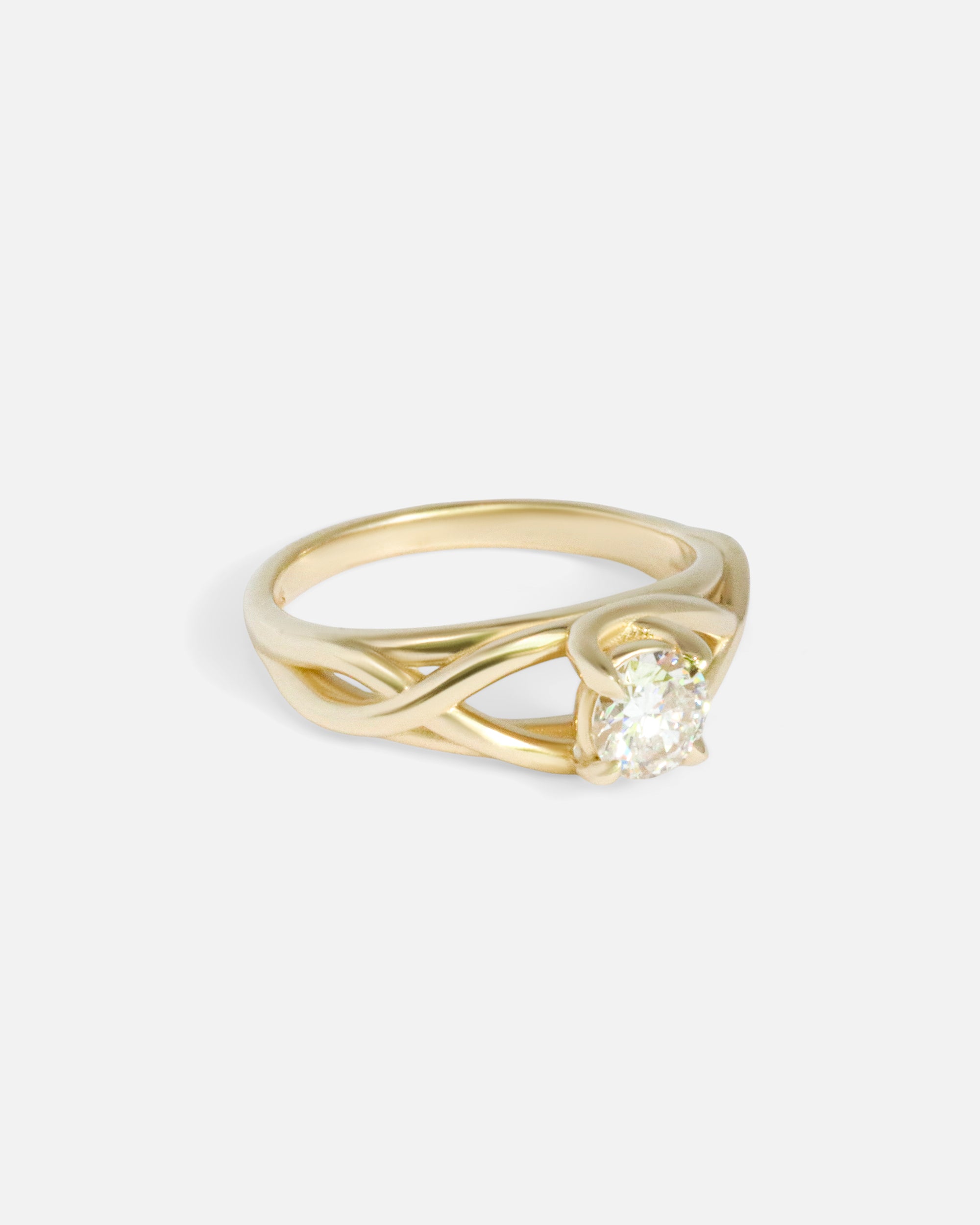 Angled side view of Twist Solitaire Ring by Kestrel Dillon