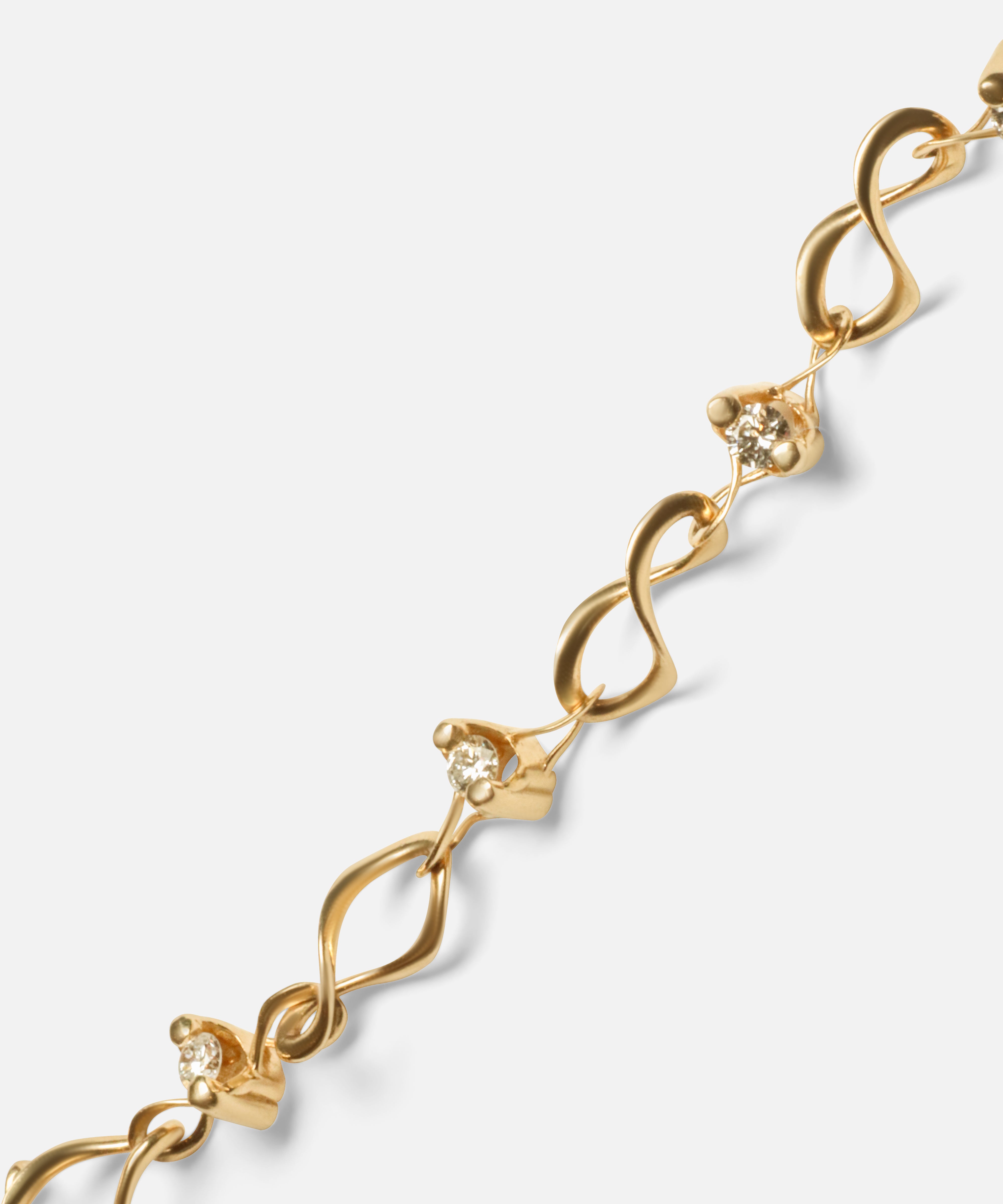 Close detail view of Locus Intermittendi Bracelet in 14k yellow gold By Lucia B Marti