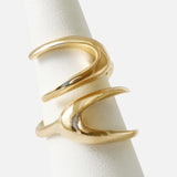 Angled view of X Ring By Lucia B Marti on stand