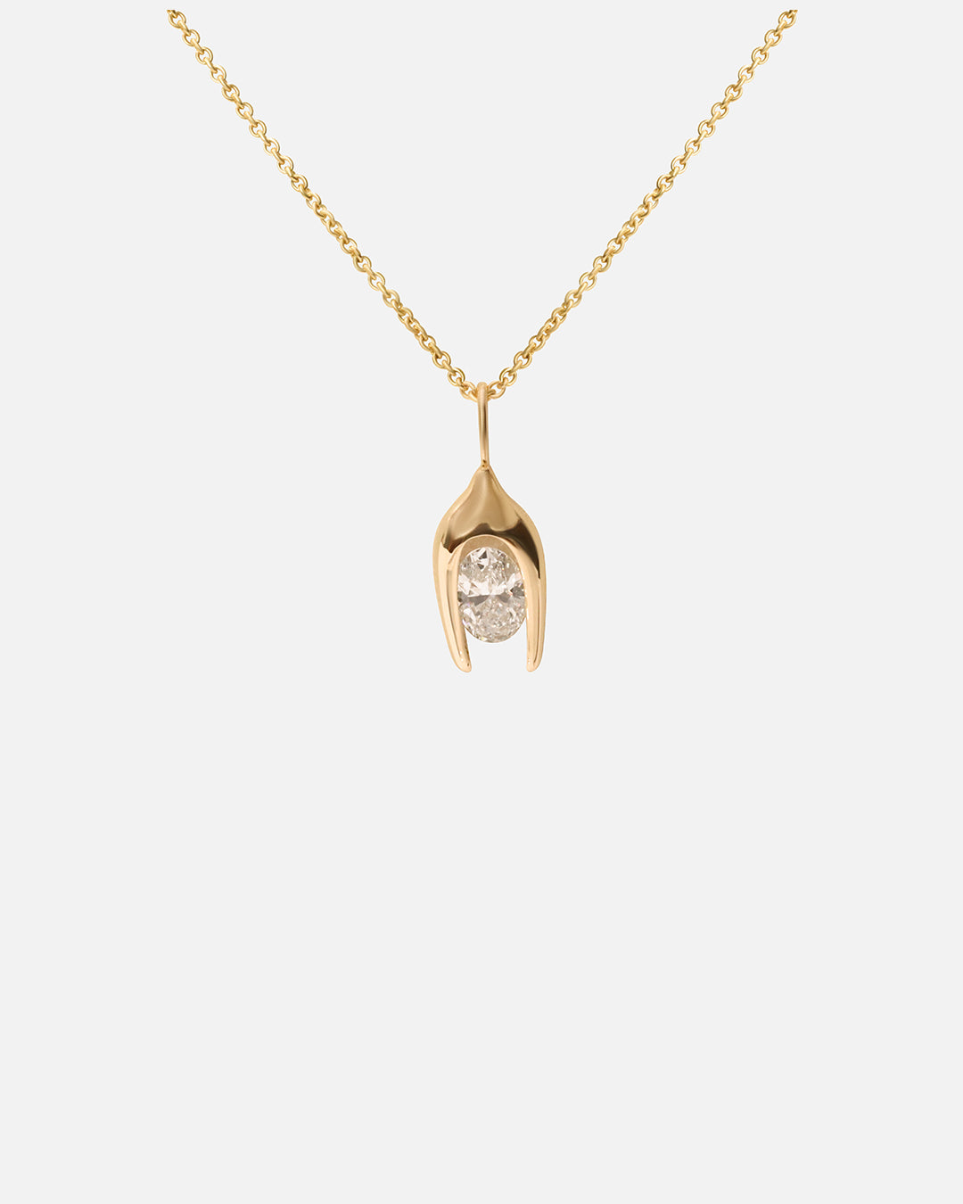 Front view of Y Oval Pendant in 14k yellow gold by Lucia B Marti