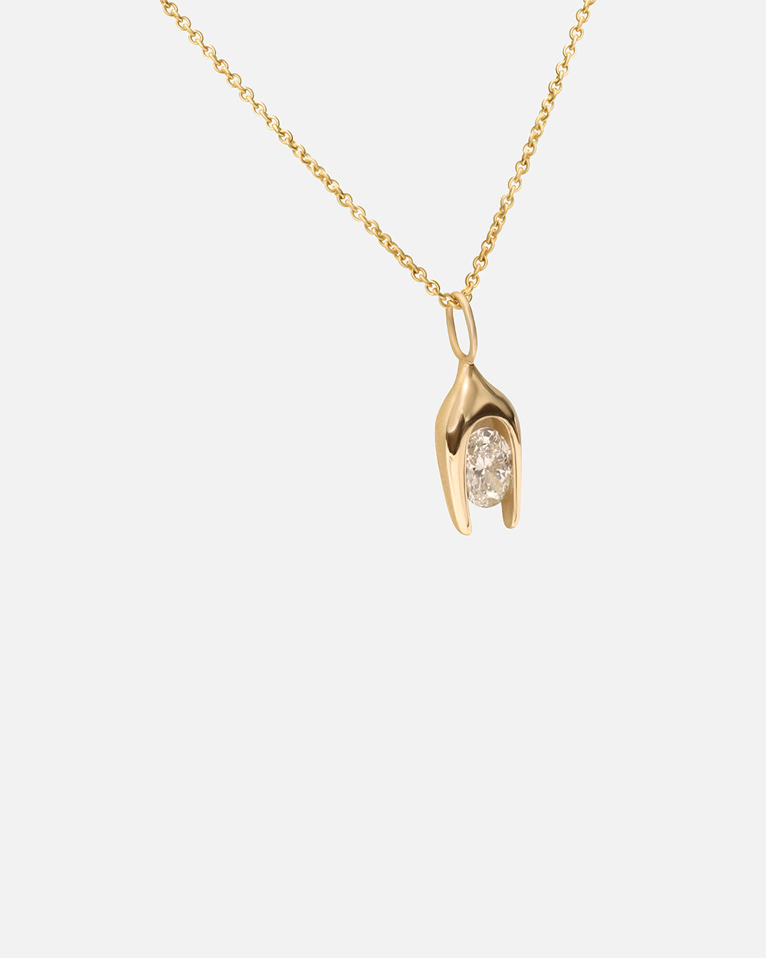 Side view of Y Oval Pendant in 14k yellow gold by Lucia B Marti