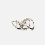Stacked view of Twist Stack Rings in 14k white gold by Lucia B Marti