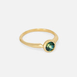 Angled side view of Lou / Round Sapphire Ring by Casual Seance