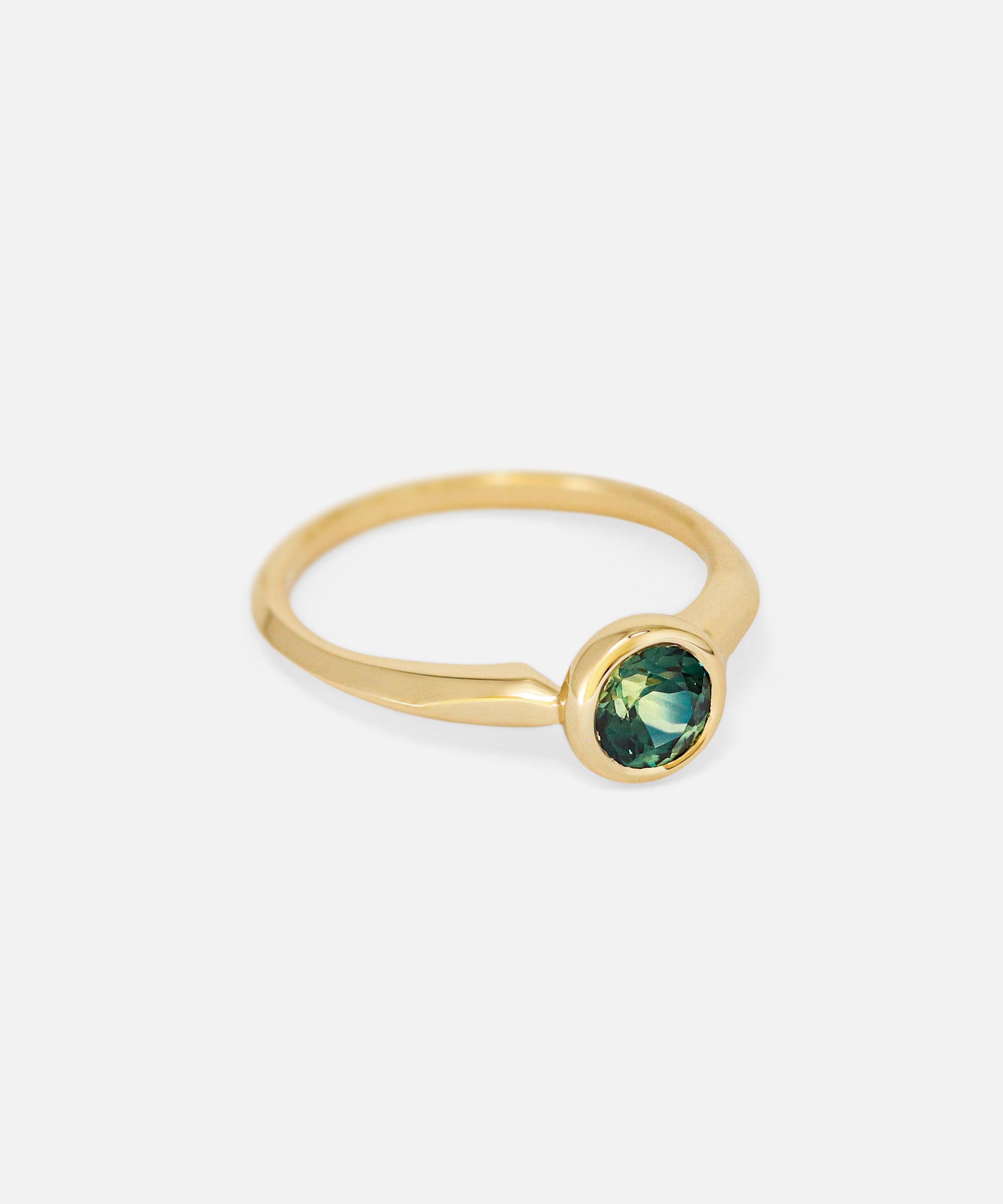 Angled side view of Lou / Round Sapphire Ring by Casual Seance