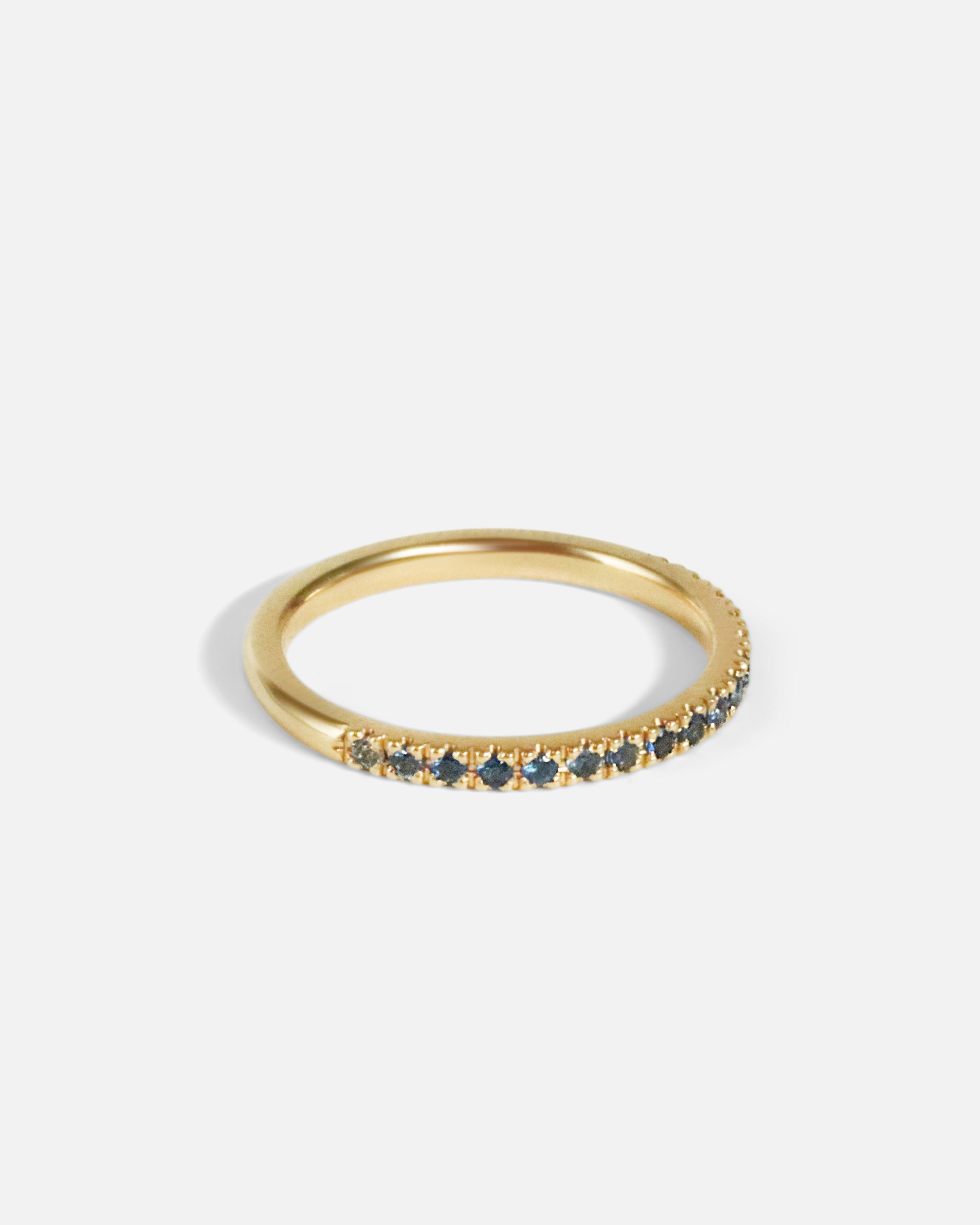 Angled side view of Standard Pavé Band / Sapphire by O Channell Designs