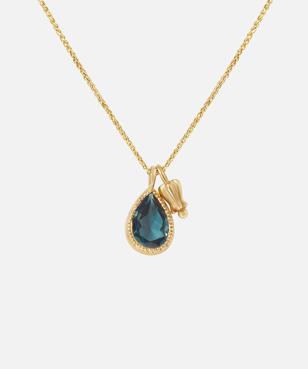 Front view of Little Mirror and Topaz Pendant