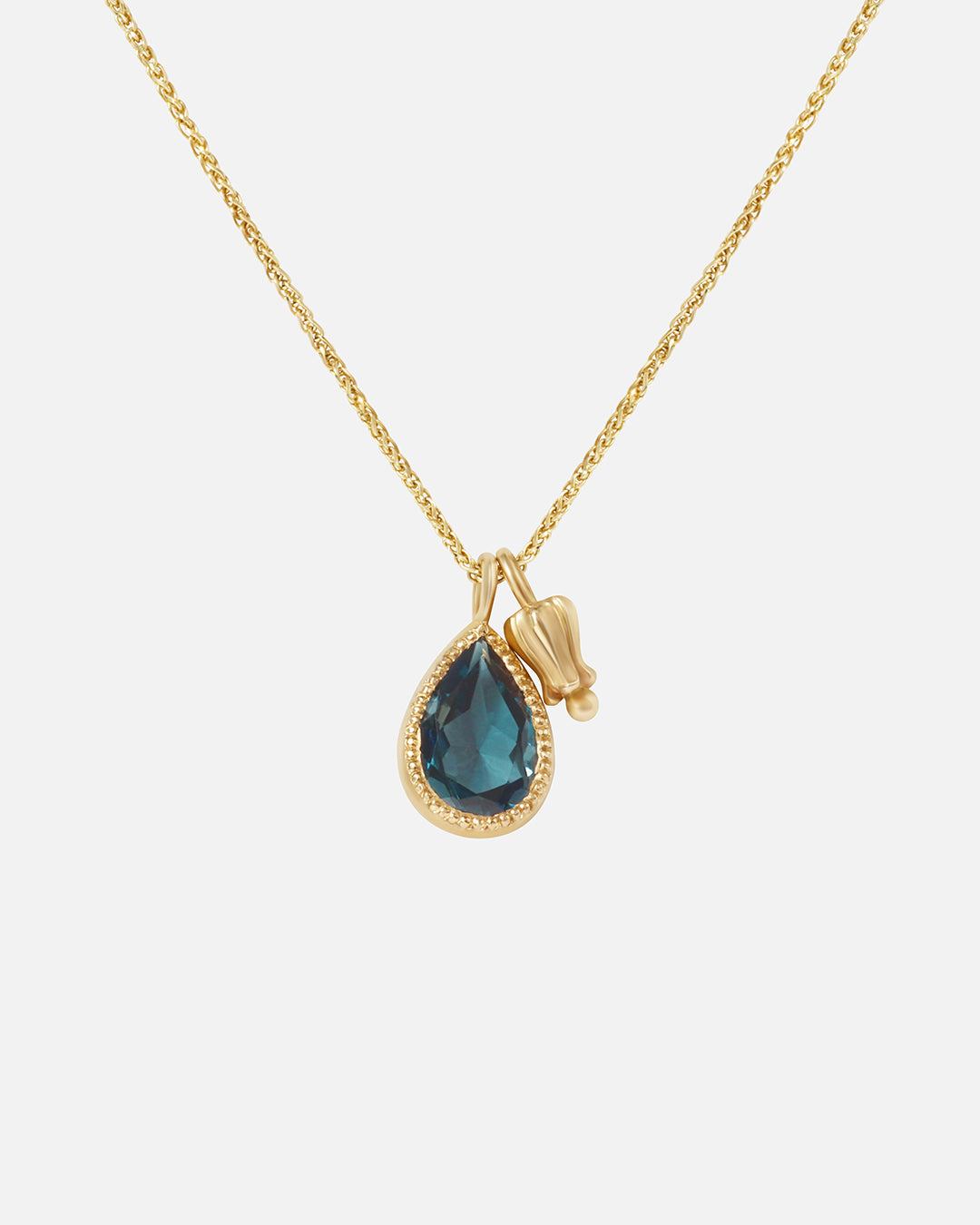 Front view of Little Mirror and Topaz Pendant