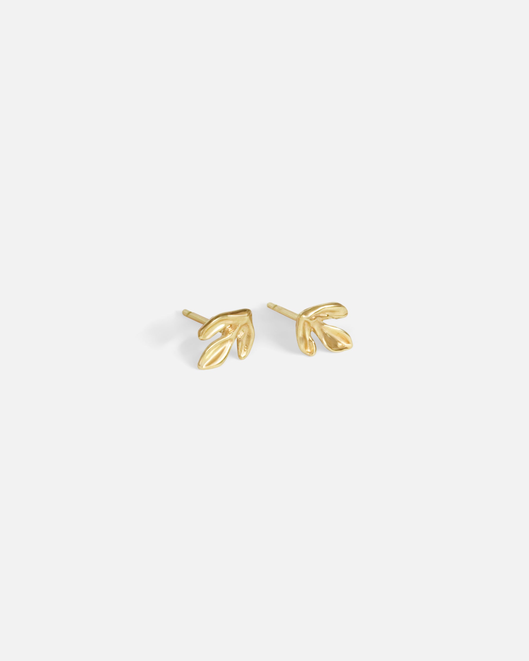 Angled side view of Leaf Studs by O Channell Designs