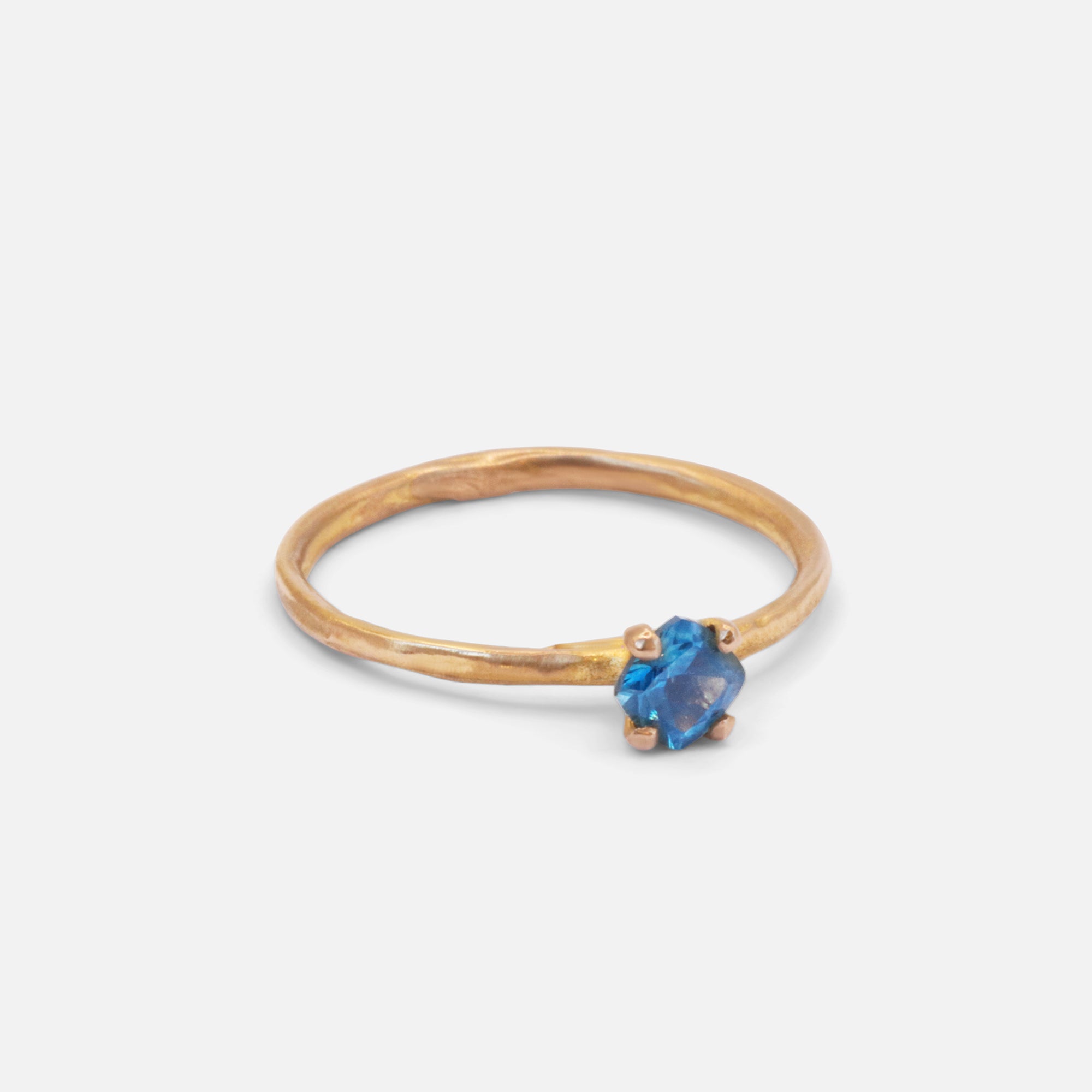 Side view of Stello / Teal Sapphire Ring