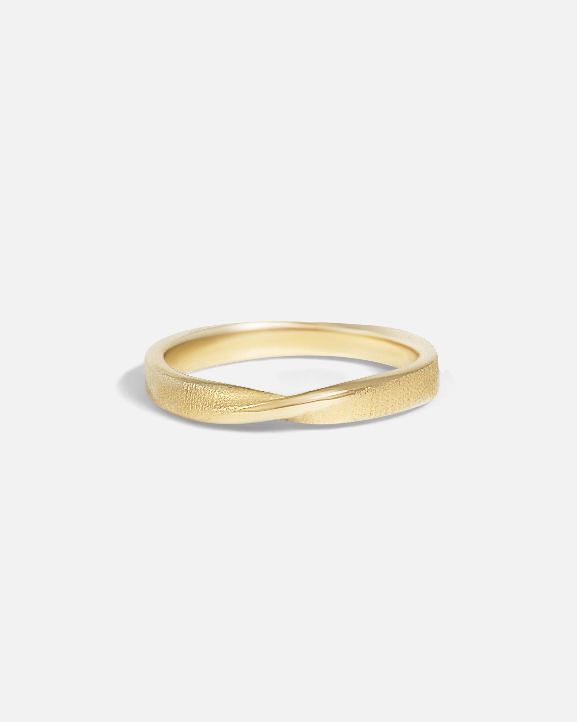 Front view of Hwan Twist Ring by Young Sun Song in 14k Brown Gold