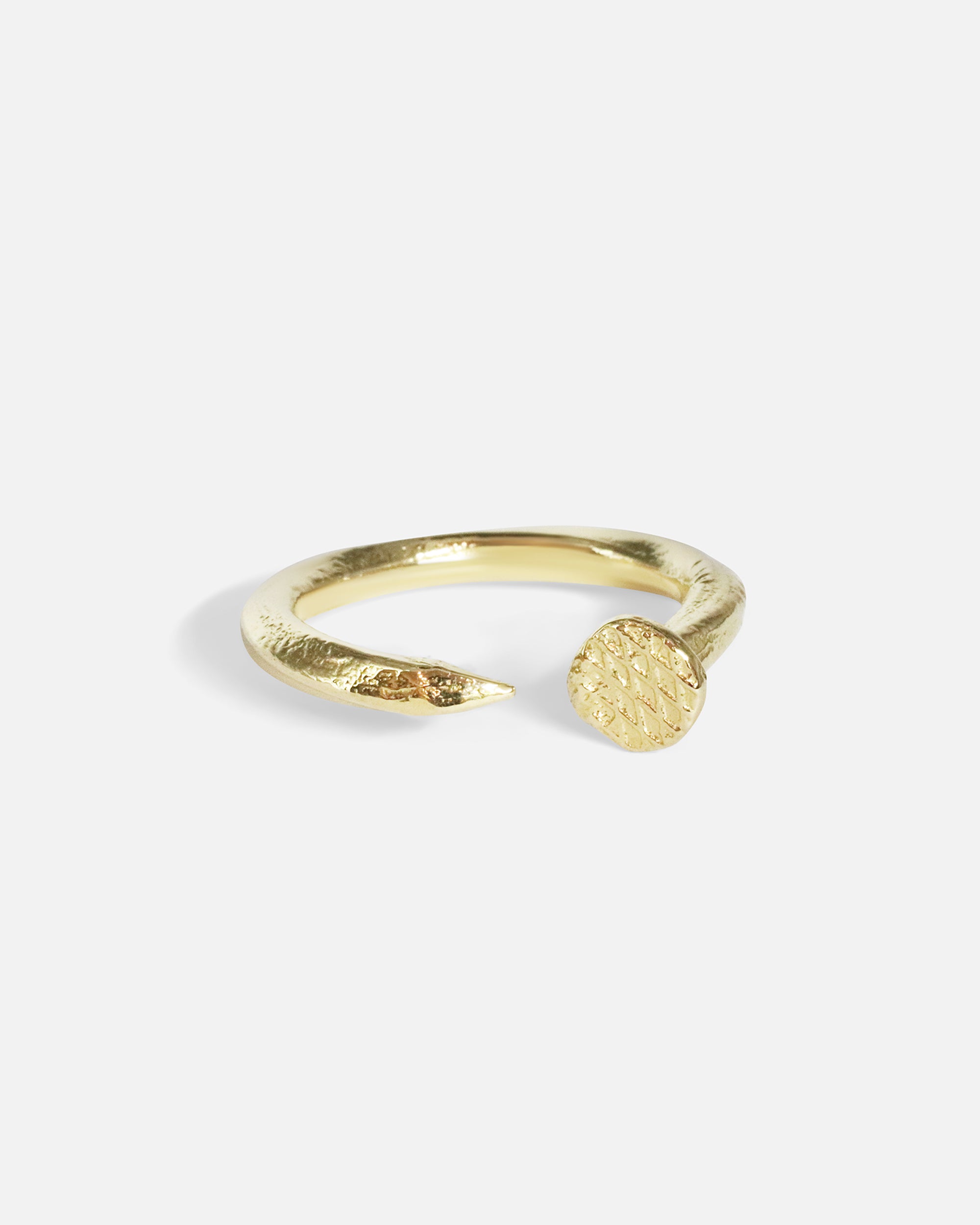 Side view of Twisted Nail Ring in 14k yellow gold by Ides