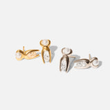 Group shot of Mutation Earrings in 14k yellow gold and 14k white gold by Lucia B Marti