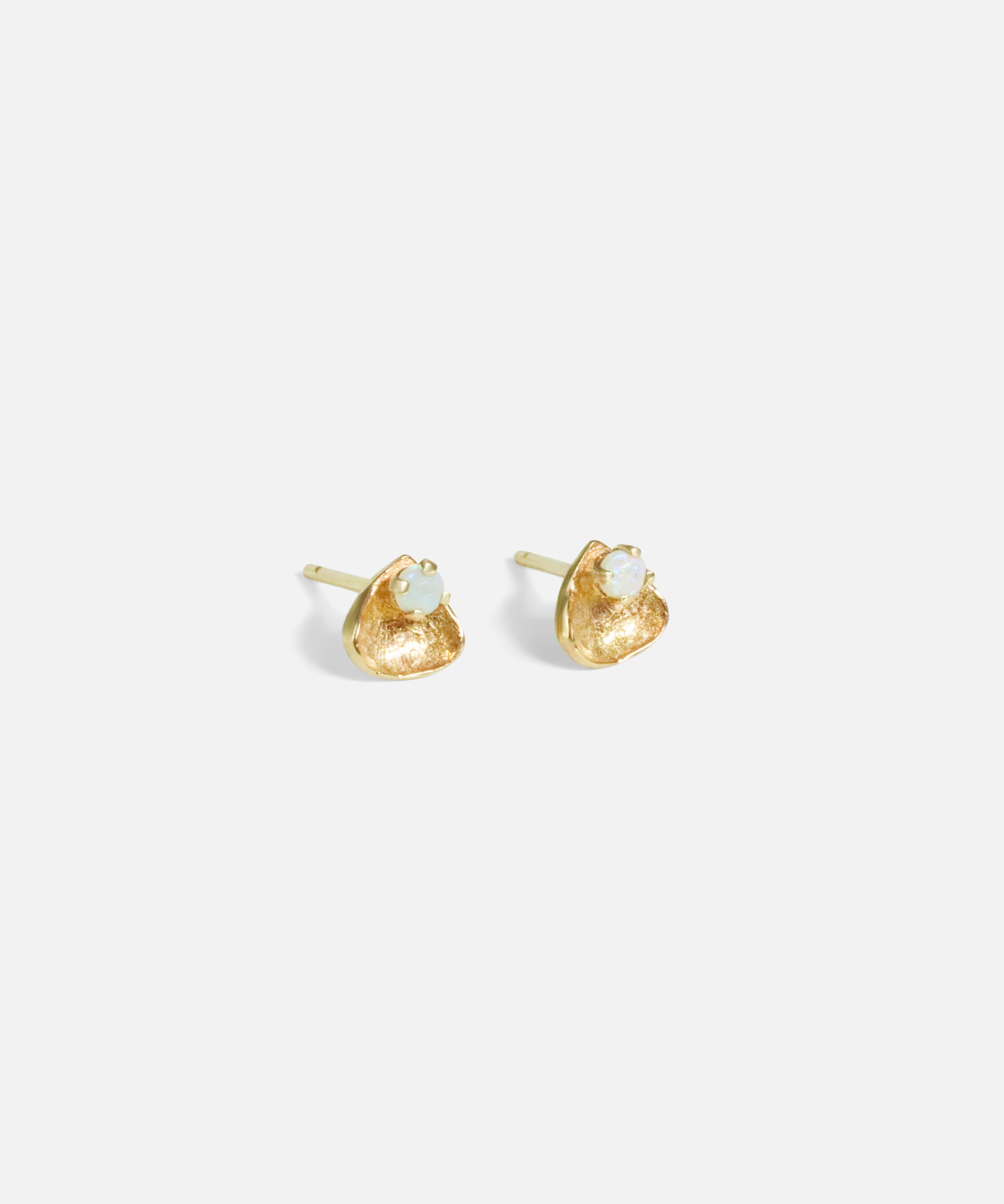 Angled side view of Opal Petal Studs by Nishi