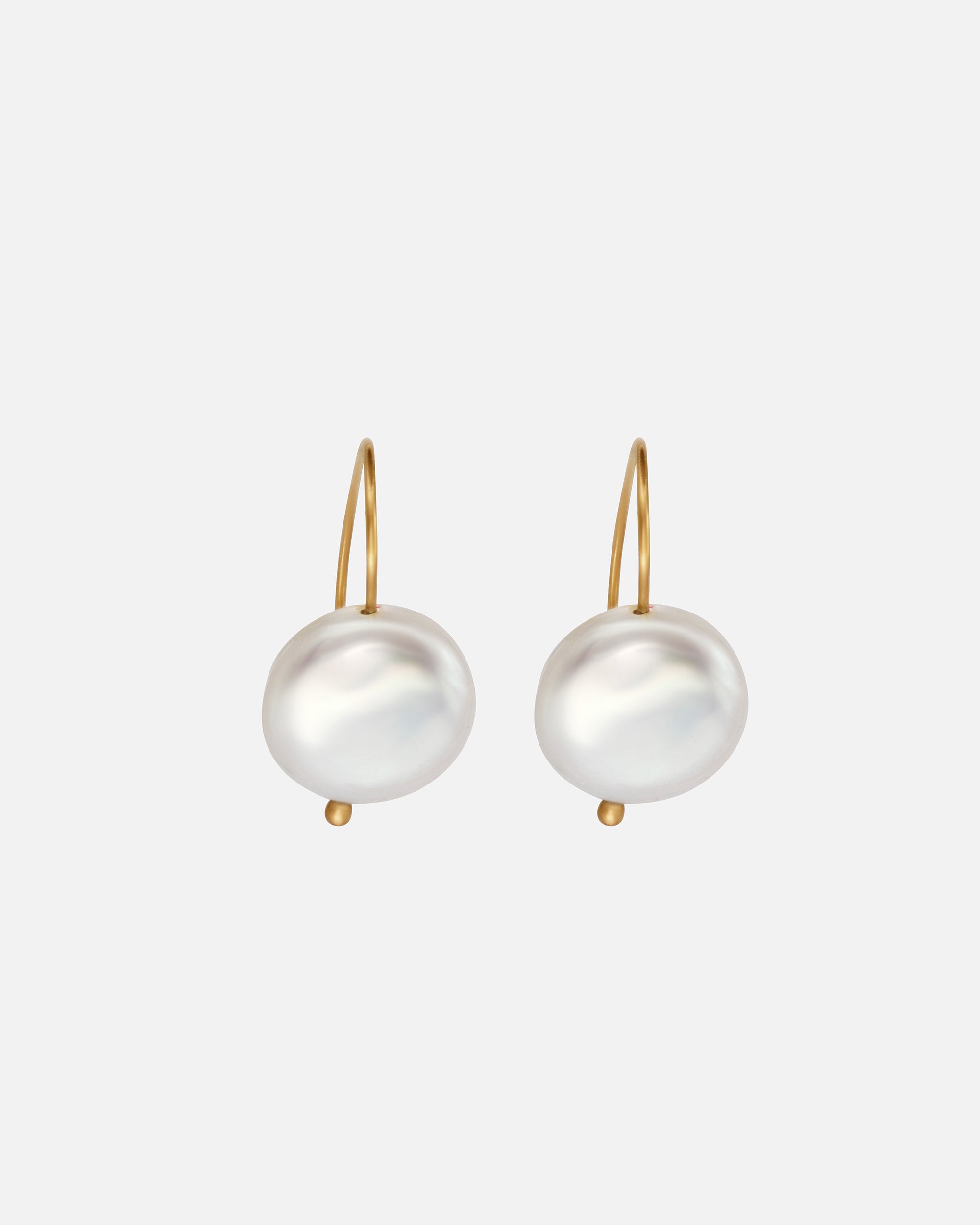 Front view of Button Pearl Earrings