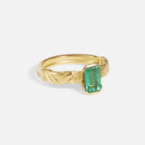Angled side view of Paths / Columbian Emerald Ring by Young Sun Song