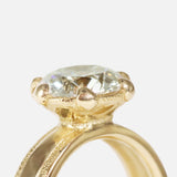 Close up agled side profile view of Parallel Band / Lab Round Brilliant Diamond by Young Sun Song